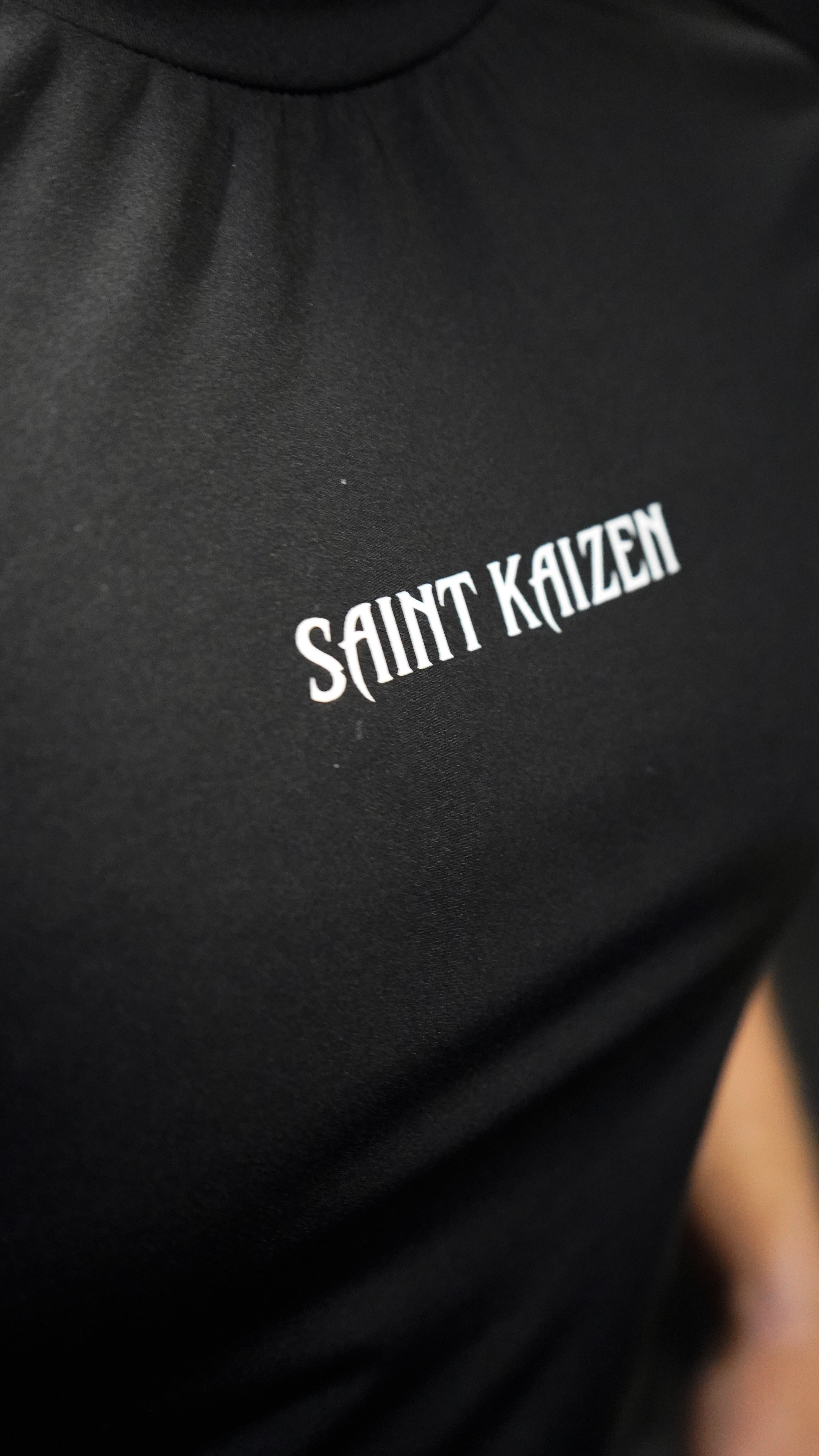 Saint Kaizen Angel Warrior Compression Tee. High-performance Christian gym wear with printed spiritual artwork. Tailored, ergonomic fit for muscle support.