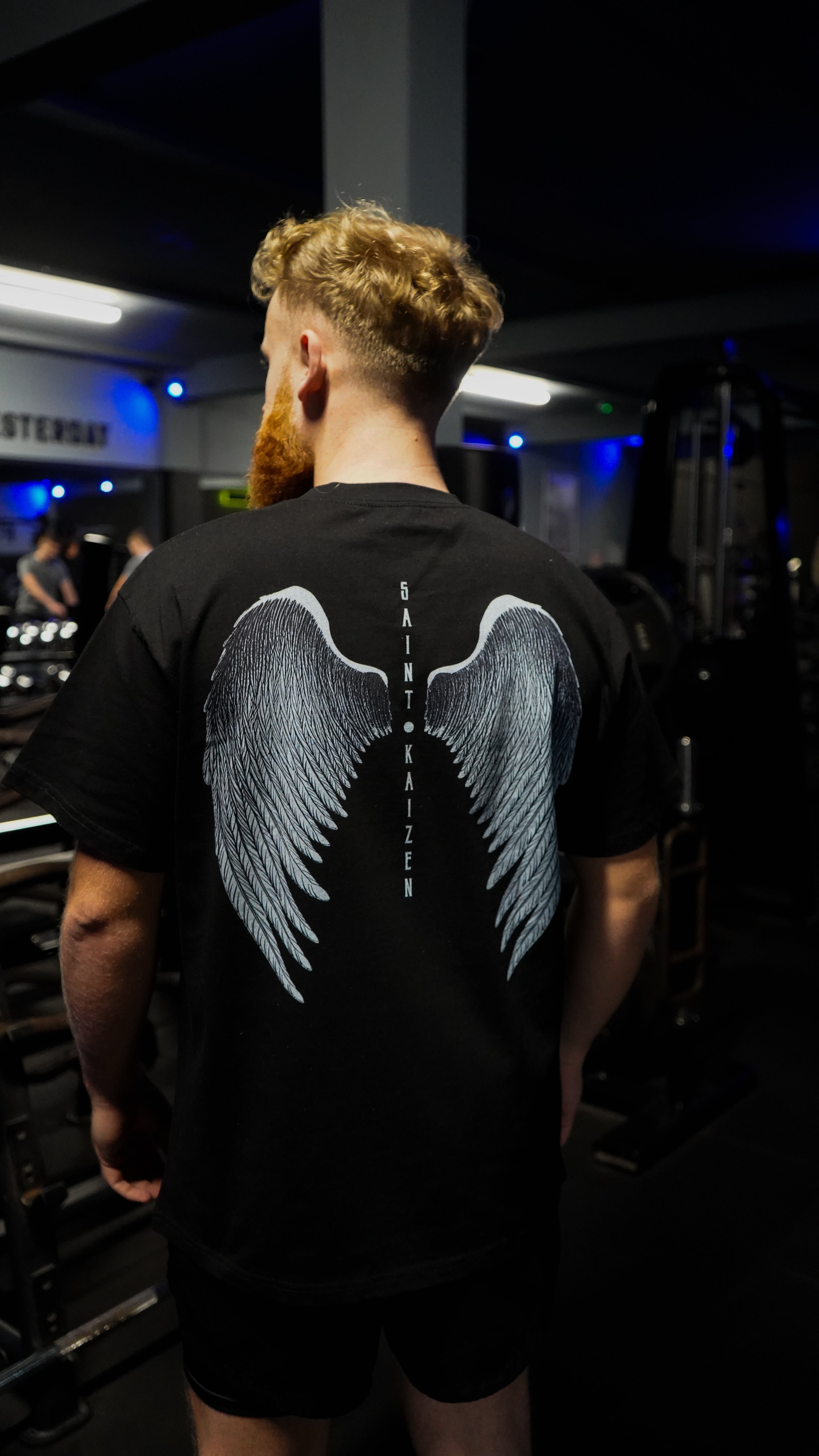 Saint Kaizen Christian gym wear shirt. Features the bold Angel Wings T-Shirt - Black spiritual design. Oversize fit made from premium 220gr cotton.