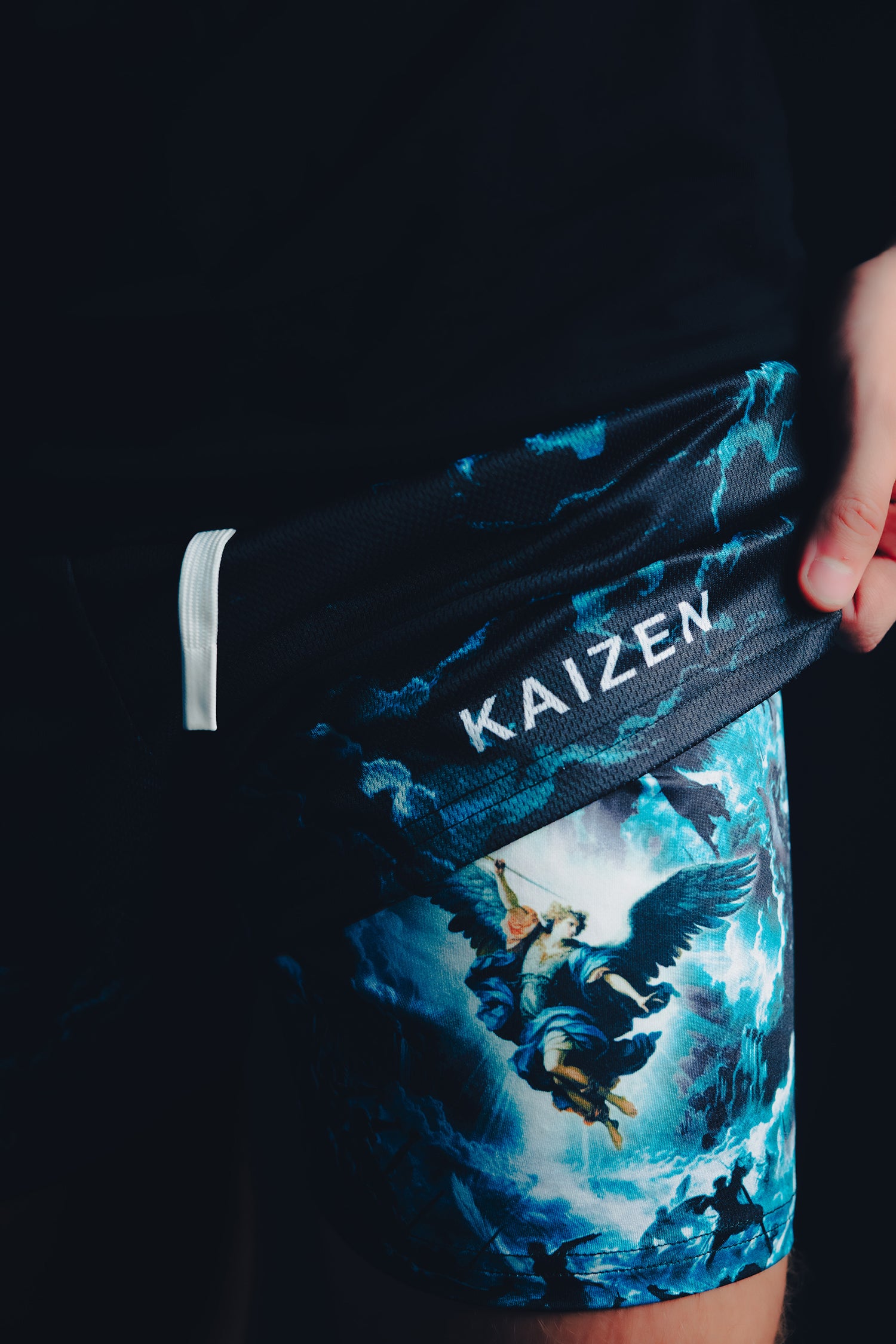 Saint Kaizen Christian gym wear Archangel Gabriel Performance Shorts. Two-layer shorts built for optimal mobility, featuring secure pockets and premium fabric.