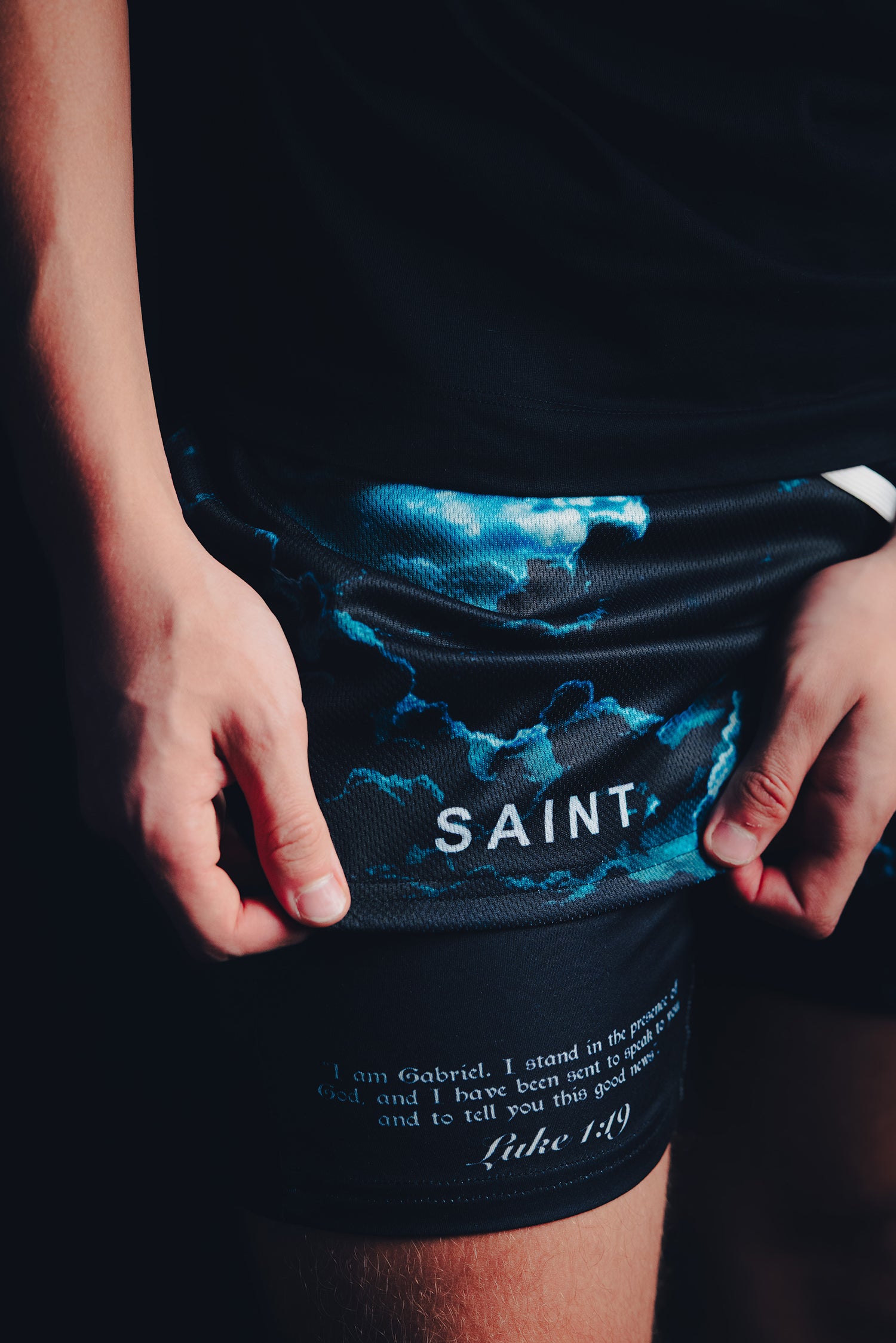 Saint Kaizen Christian gym wear Archangel Gabriel Performance Shorts. Two-layer shorts built for optimal mobility, featuring secure pockets and premium fabric.
