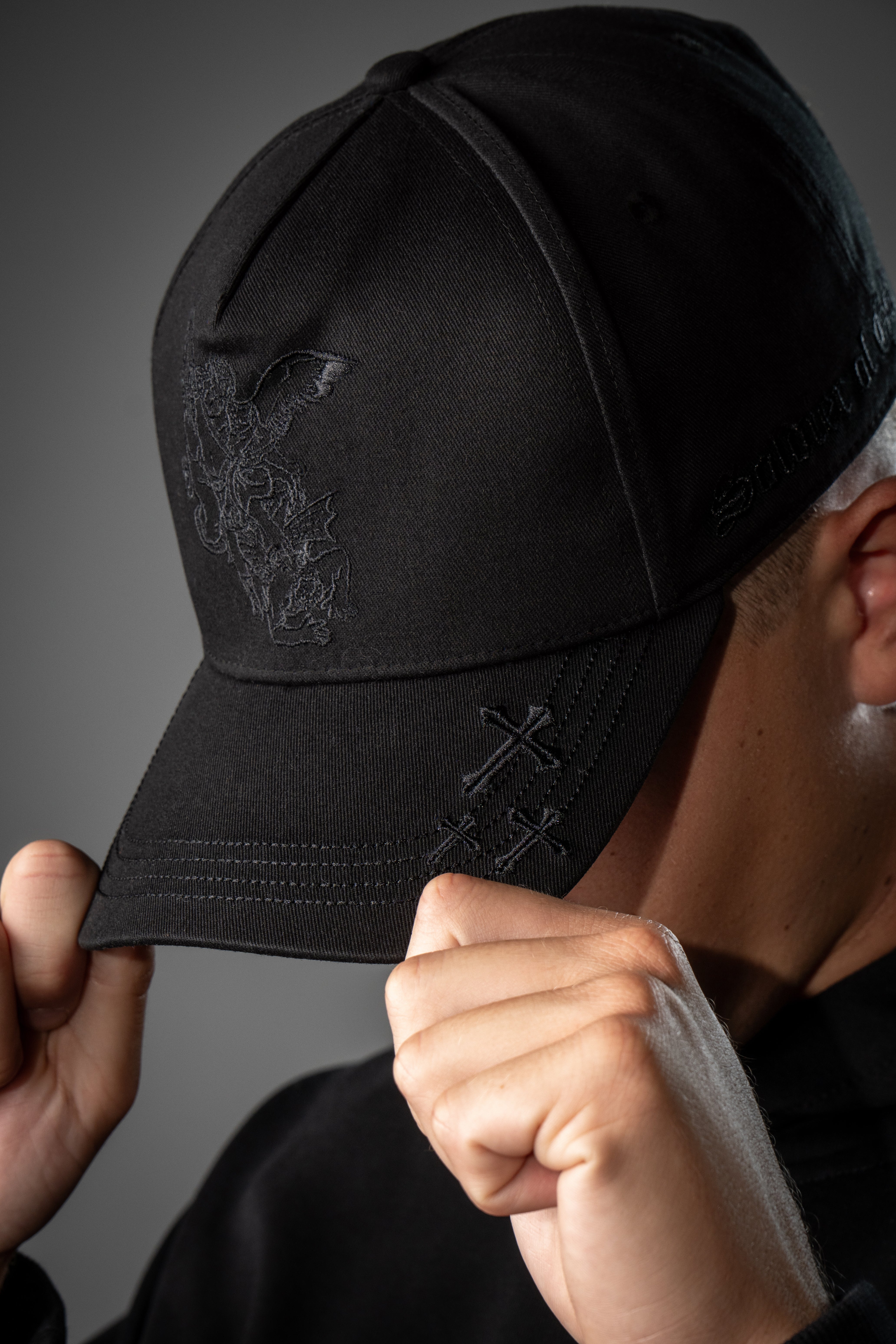 Saint Kaizen premium Christian gym wear Archangel Michael Cap - Black. Features bold spiritual Artwork, A comfortable cap designed for both the gym and casual wear.