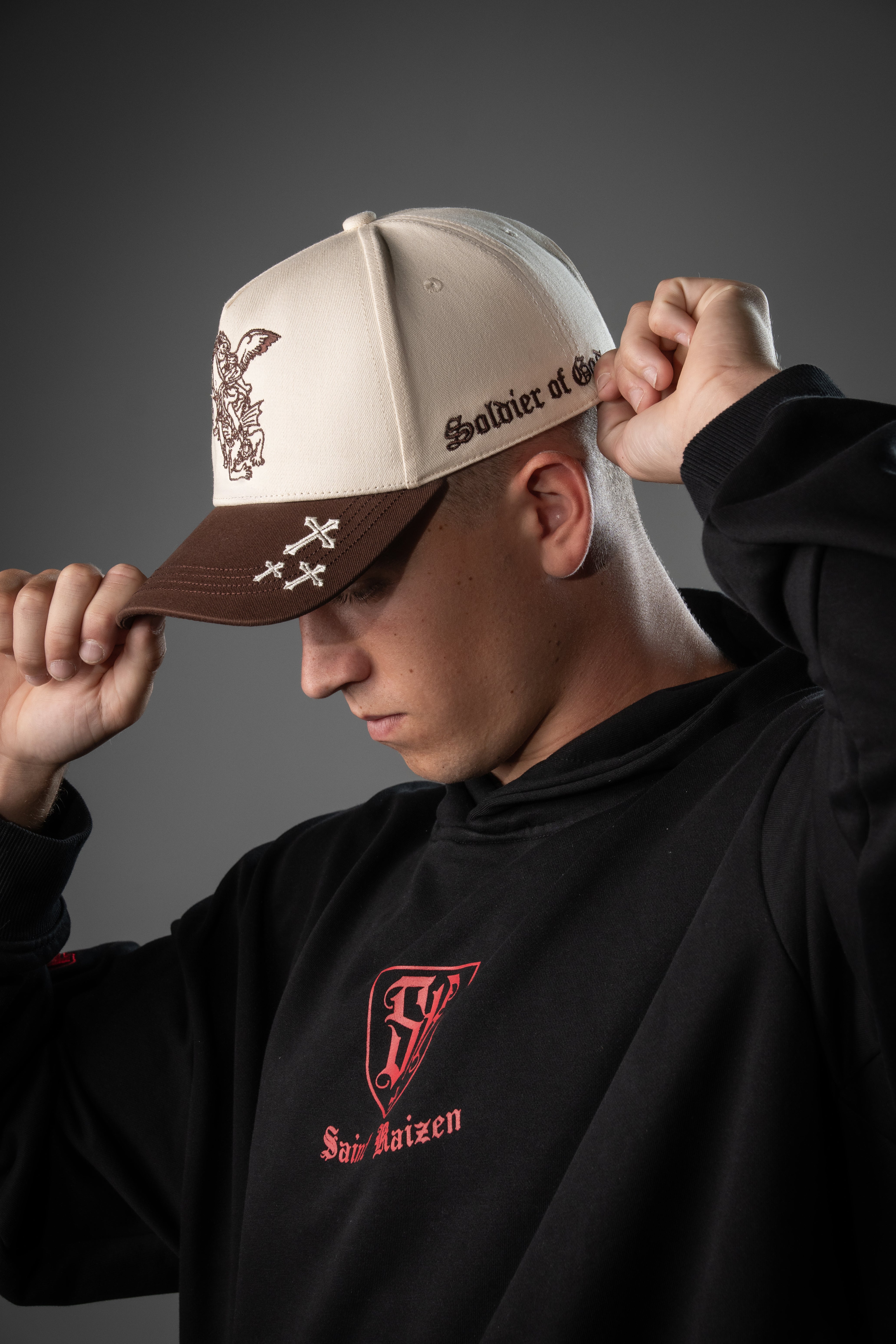 Saint Kaizen premium Christian gym wear Archangel Michael Cap - Brown and Beige. Features bold spiritual Artwork, A comfortable cap designed for both the gym and casual wear.