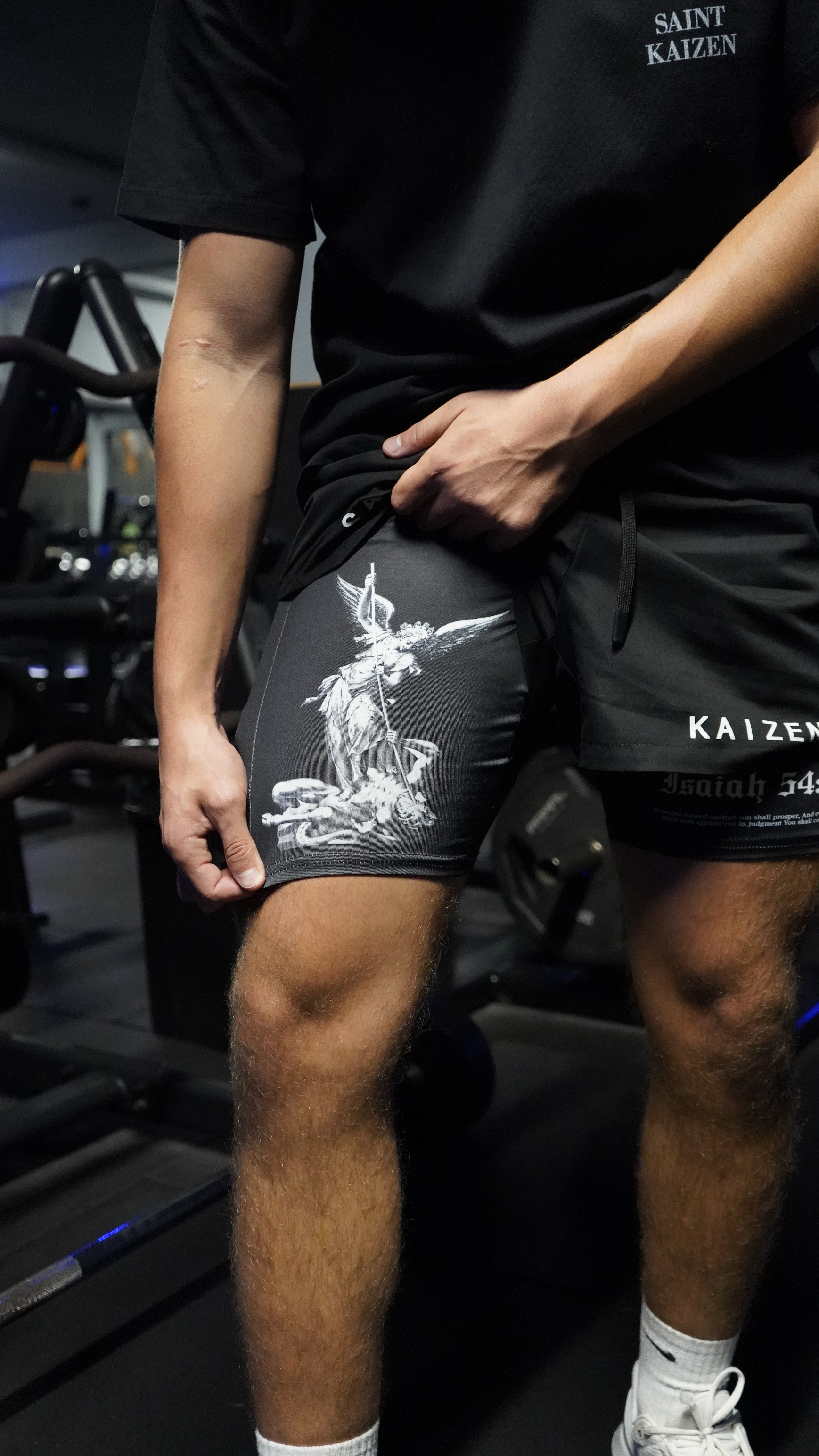 Saint Kaizen Christian gym wear Archangel Michael Performance Shorts. Two-layer shorts built for optimal mobility, featuring secure pockets and premium fabric.