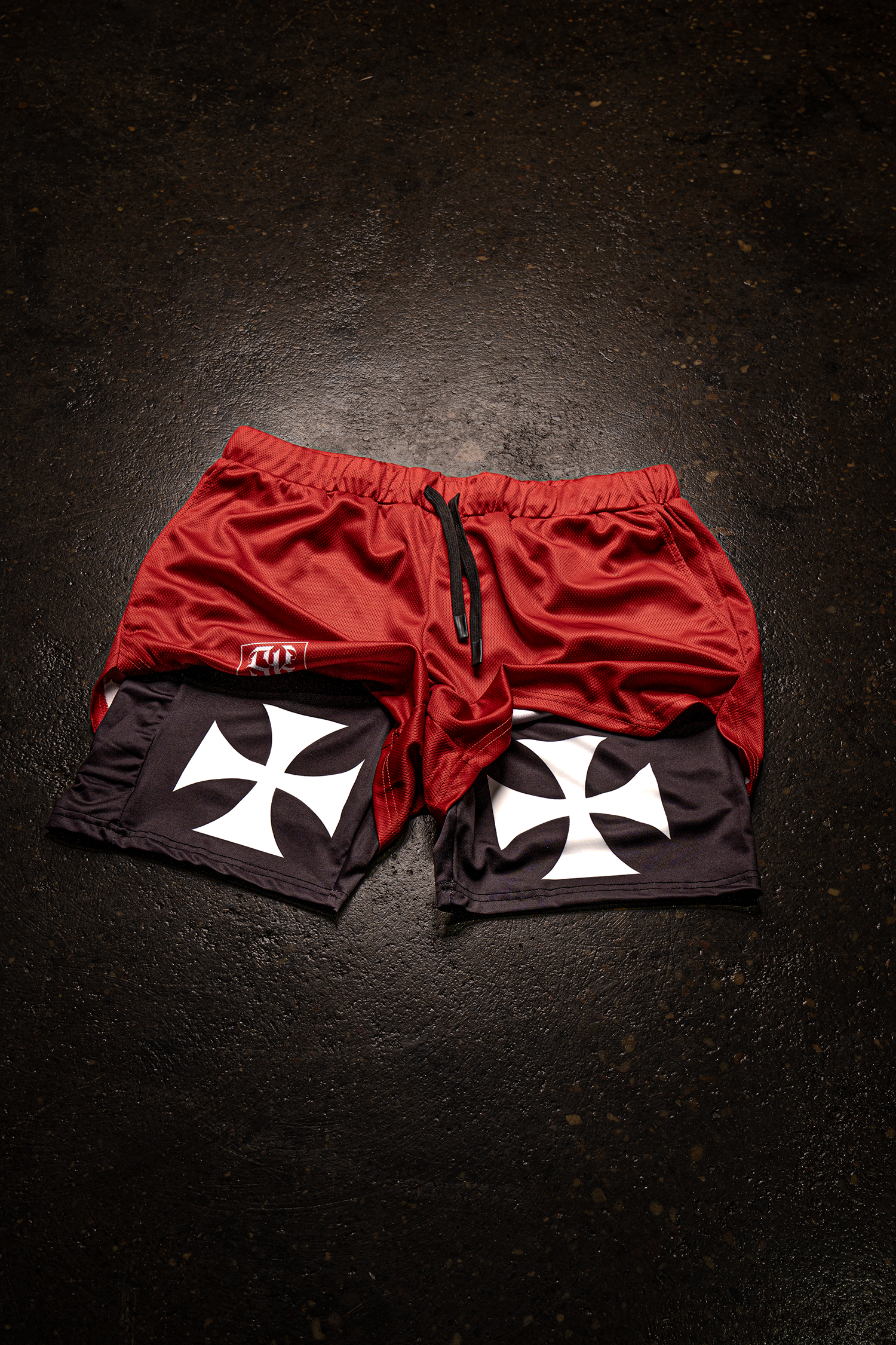 Saint Kaizen Christian gym wear Crusader Cross Performance Shorts - Red. Two-layer shorts built for optimal mobility, featuring secure pockets and premium fabric.