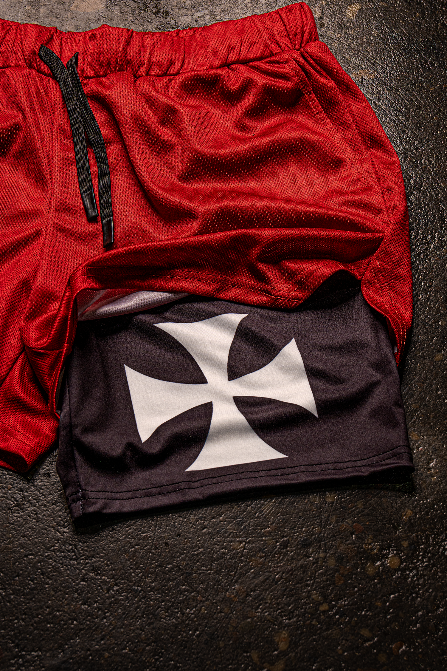 Saint Kaizen Christian gym wear Crusader Cross Performance Shorts - Red. Two-layer shorts built for optimal mobility, featuring secure pockets and premium fabric.