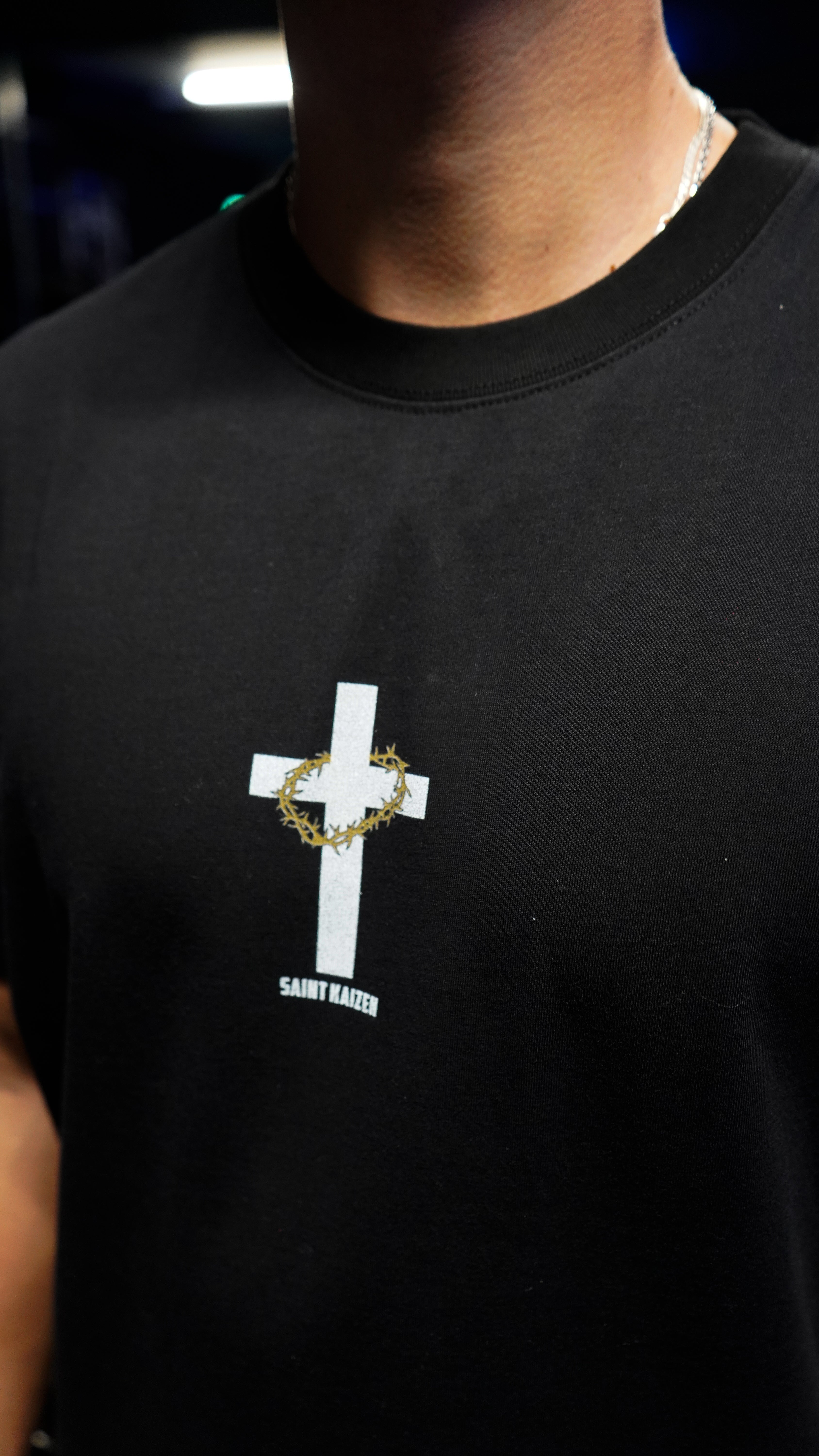 Saint Kaizen Christian gym wear shirt. Features the bold Divine T-Shirt - Black spiritual design. Oversize fit made from premium 220gr cotton.