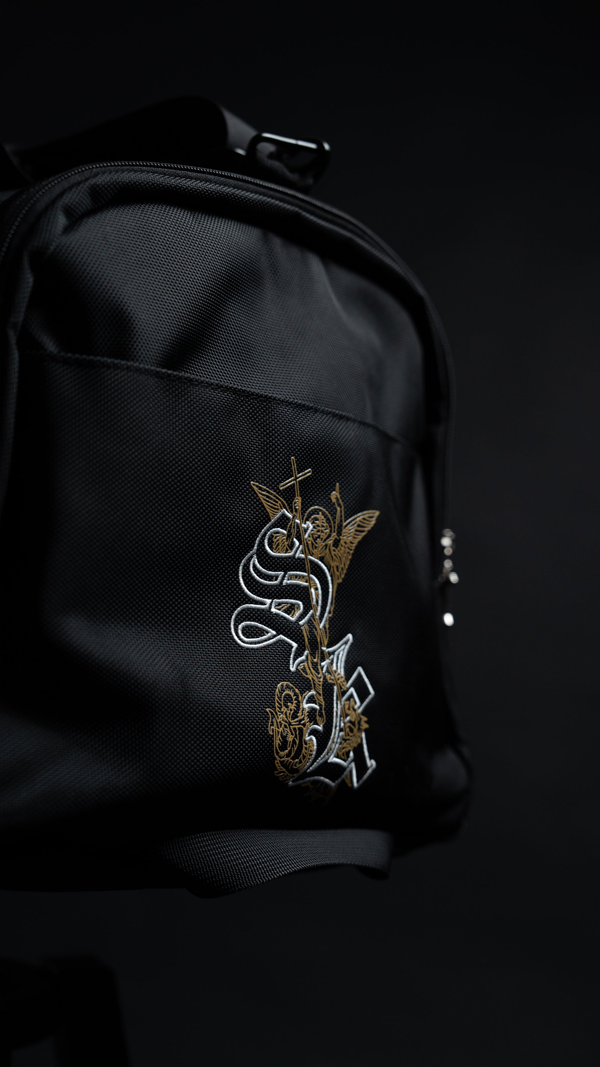 Close-up of the Saint Kaizen Fear Not Duffle Bag embroidered with the inspirational artwork. A large, spiritual 37.5L bag for Christians who train.