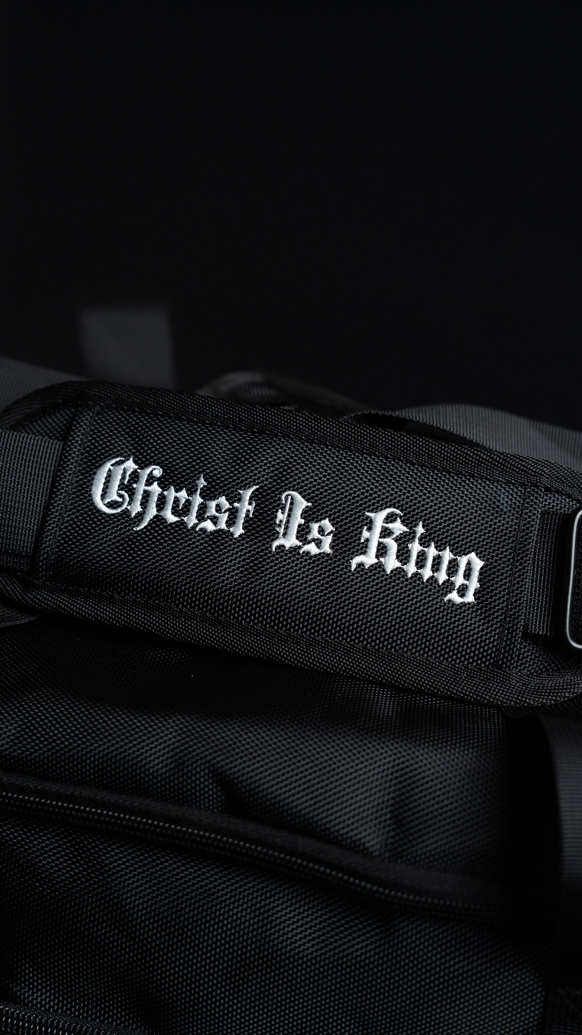 Close-up of the Saint Kaizen Fear Not Duffle Bag embroidered with the inspirational artwork. A large, spiritual 37.5L bag for Christians who train.