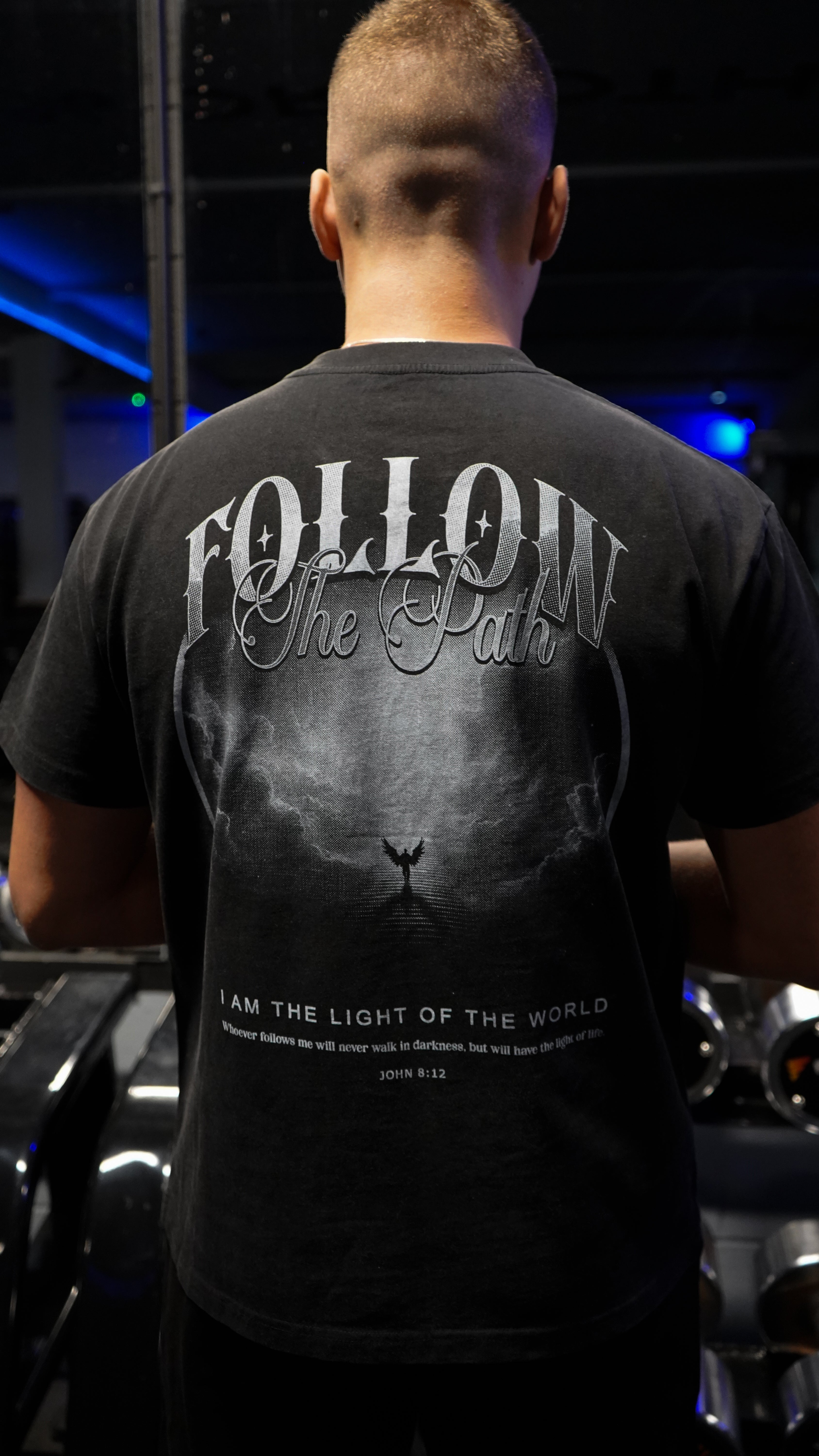 Saint Kaizen Christian gym wear shirt. Features the bold Follow The Light T-Shirt - Acid Wash Black spiritual design. Oversize fit made from premium 220gr cotton.