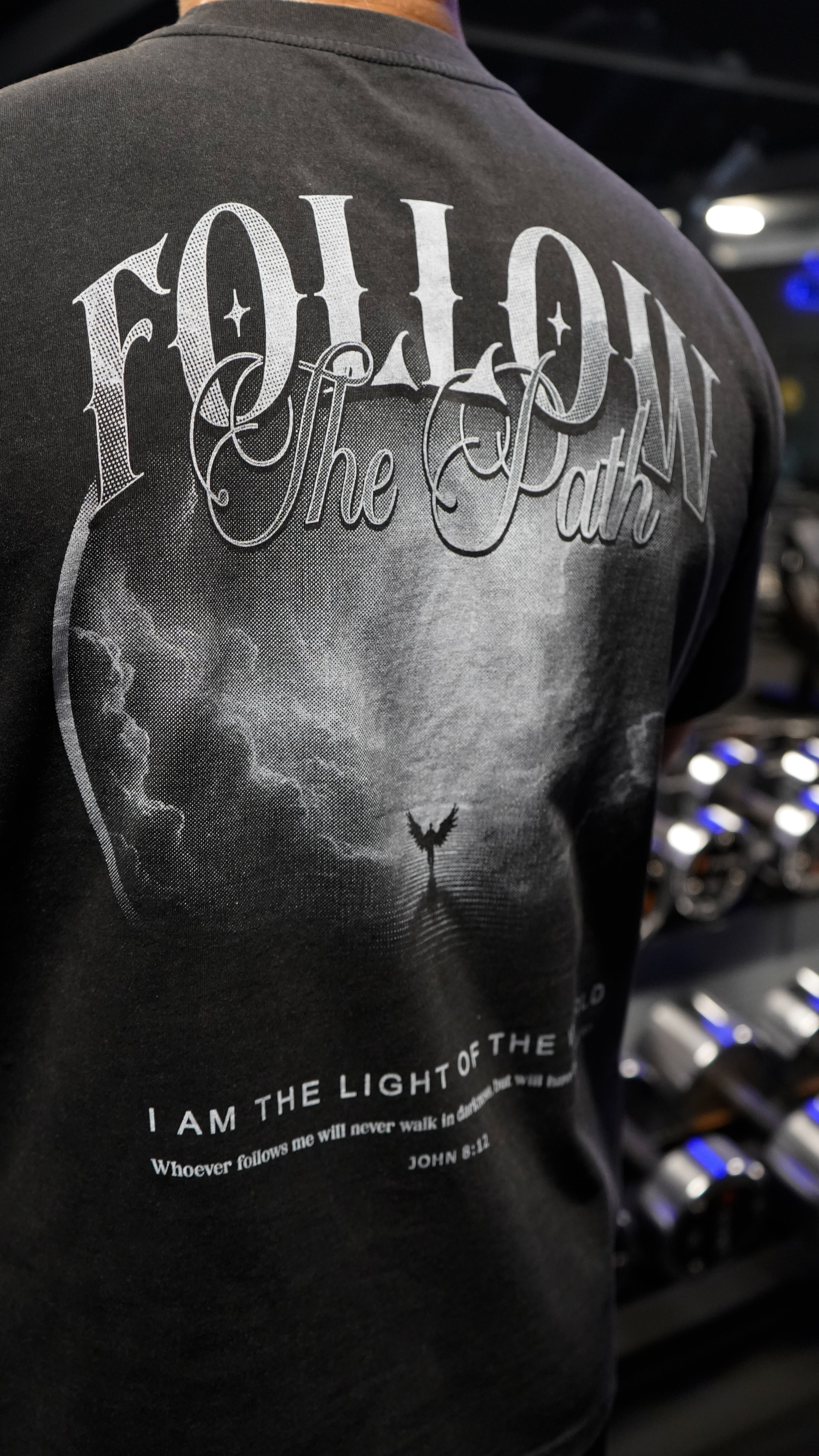 Saint Kaizen Christian gym wear shirt. Features the bold Follow The Light T-Shirt - Acid Wash Black spiritual design. Oversize fit made from premium 220gr cotton.