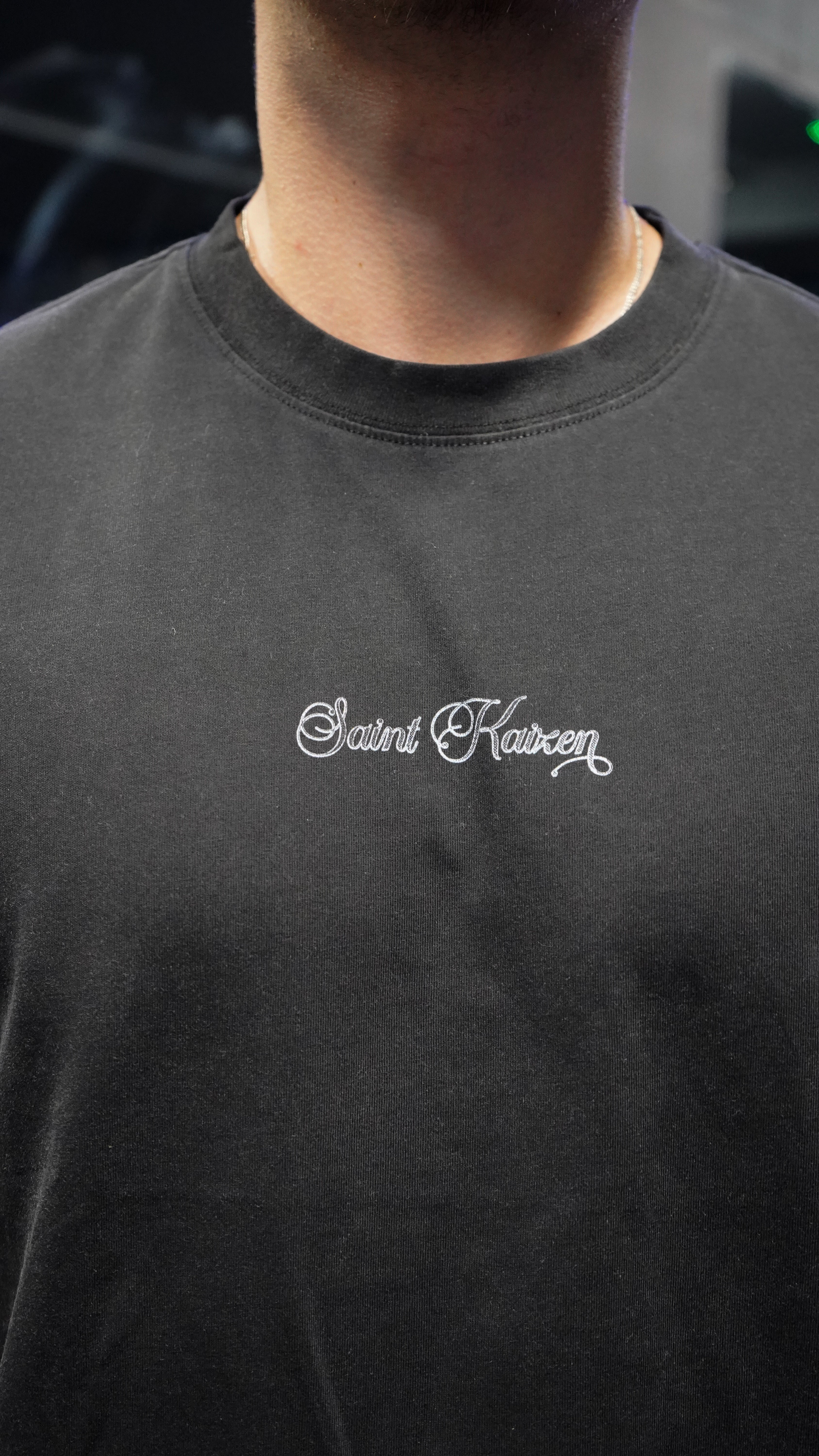 Saint Kaizen Christian gym wear shirt. Features the bold Follow The Light T-Shirt - Acid Wash Black spiritual design. Oversize fit made from premium 220gr cotton.