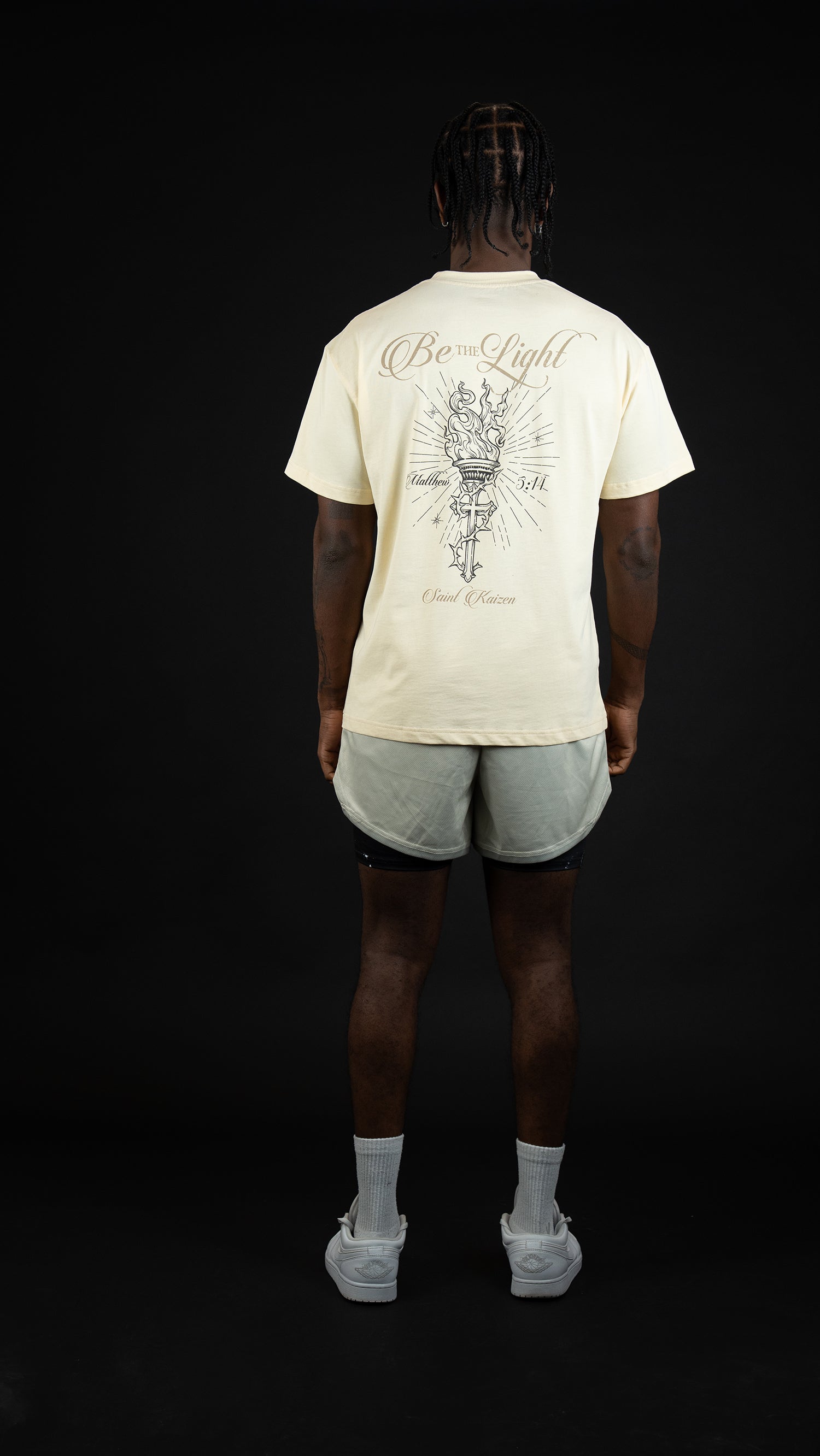 Saint Kaizen Christian gym wear shirt. Features the bold Guiding The Light T-Shirt - Cream spiritual design. Oversize fit made from premium 220gr cotton.