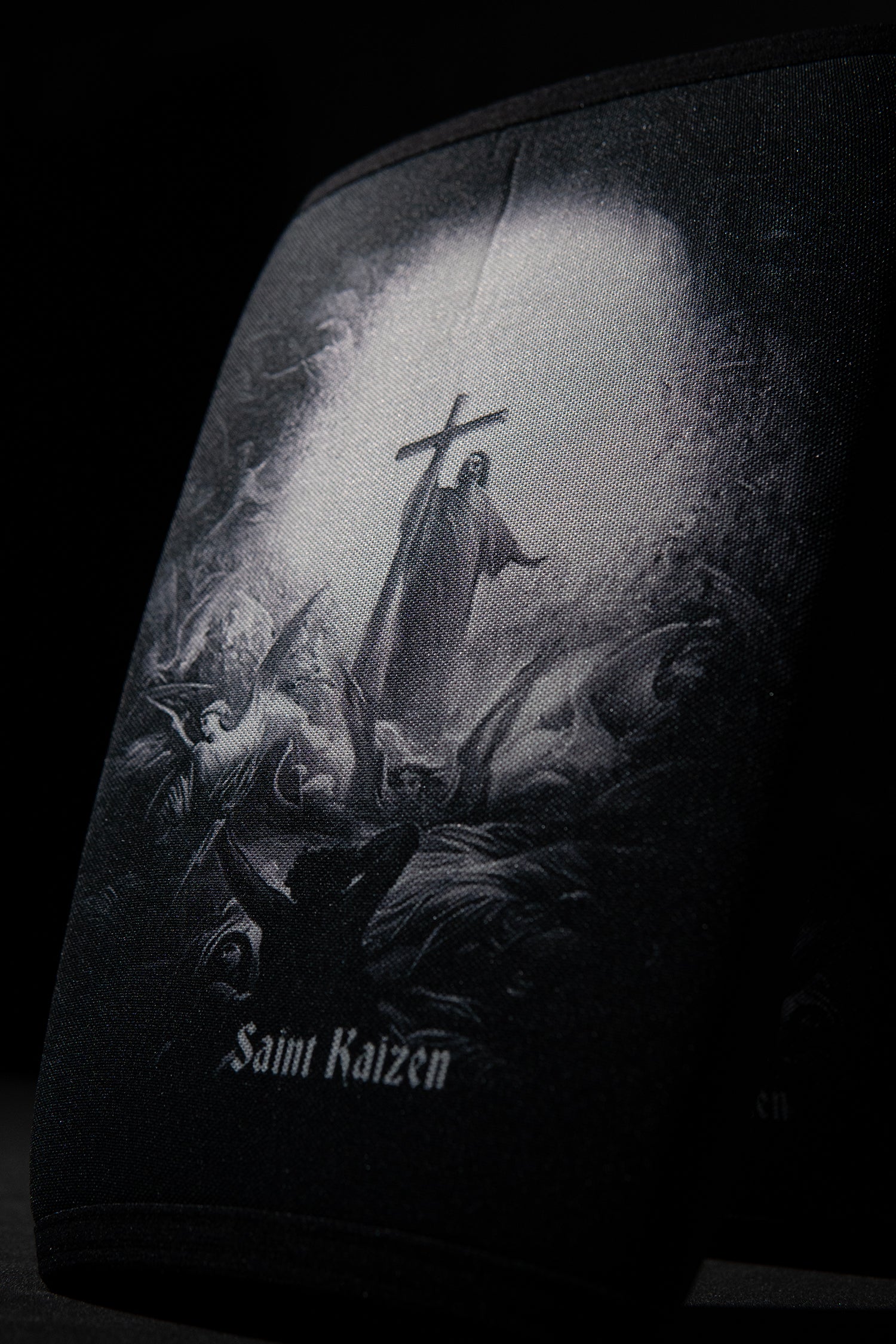 Saint Kaizen Light In The Darkness Knee Sleeves. 7mm neoprene for maximum compression and support during squats and deadlifts. Essential Christian gym wear.