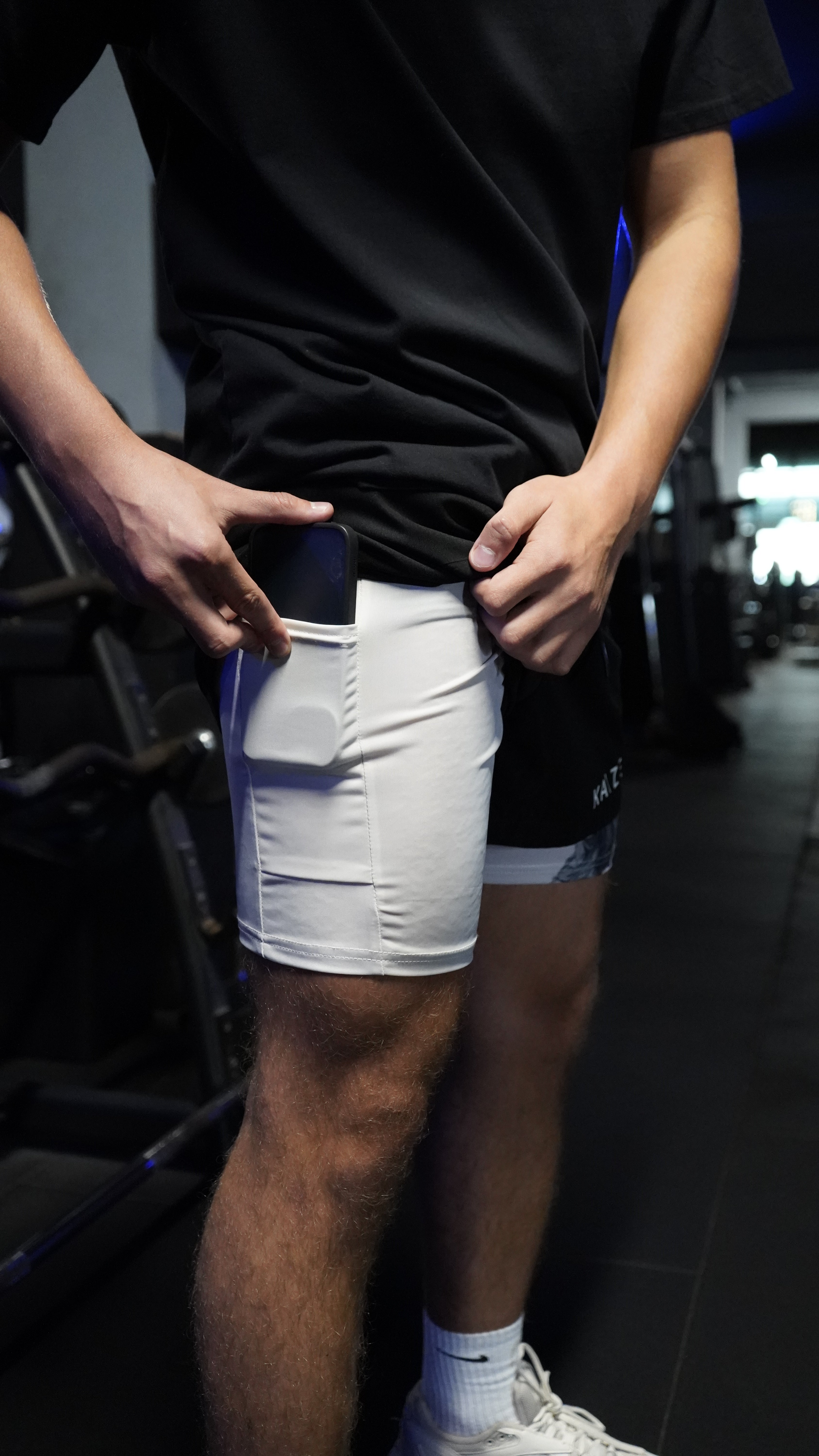 Saint Kaizen Christian gym wear Luke 23:34 Performance Shorts - Black. Two-layer shorts built for optimal mobility, featuring secure pockets and premium fabric.