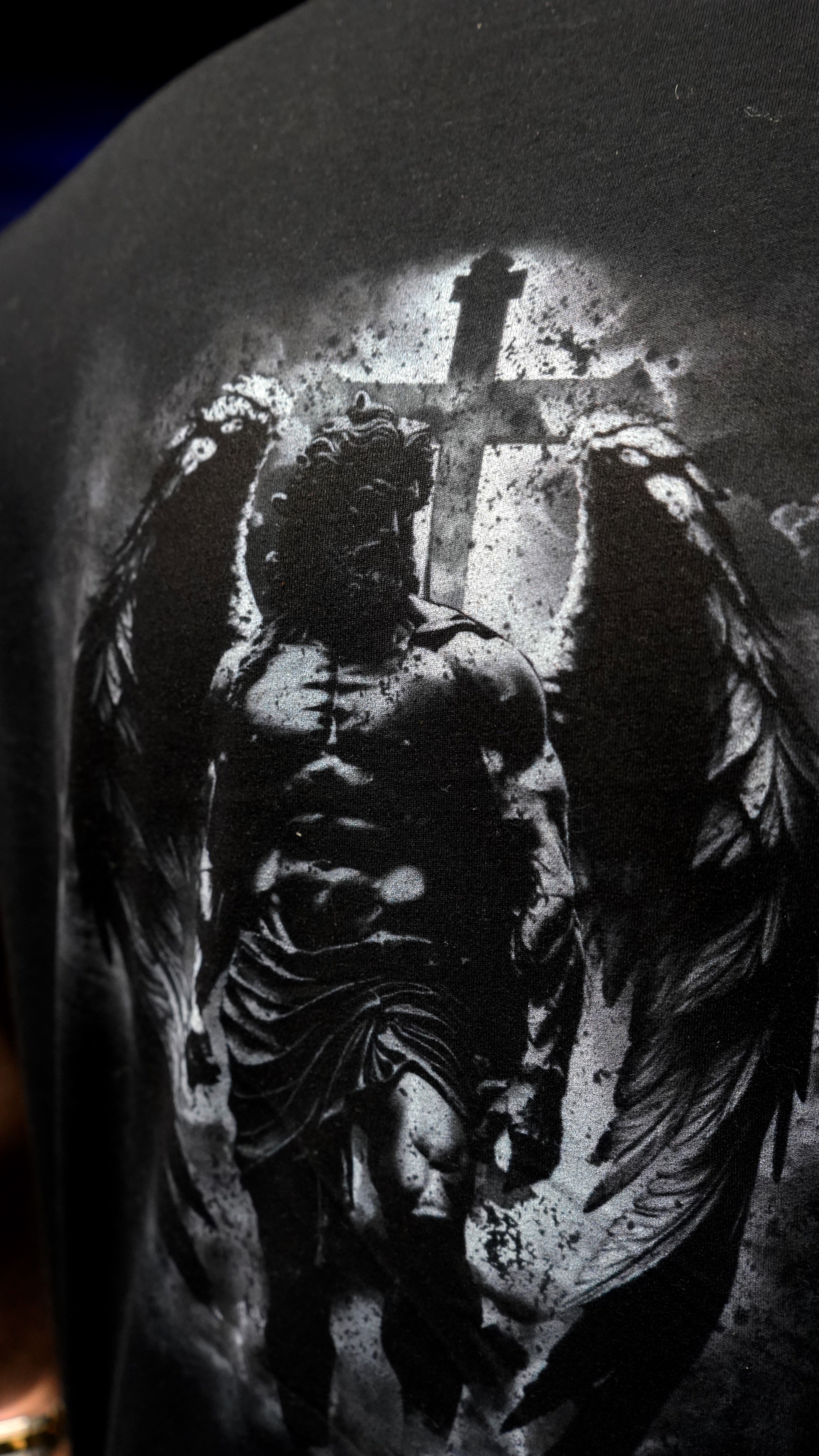 Saint Kaizen Christian gym wear shirt. Features the bold Revelation 12:7-9 T-Shirt spiritual design. Oversize fit made from premium 220gr cotton.