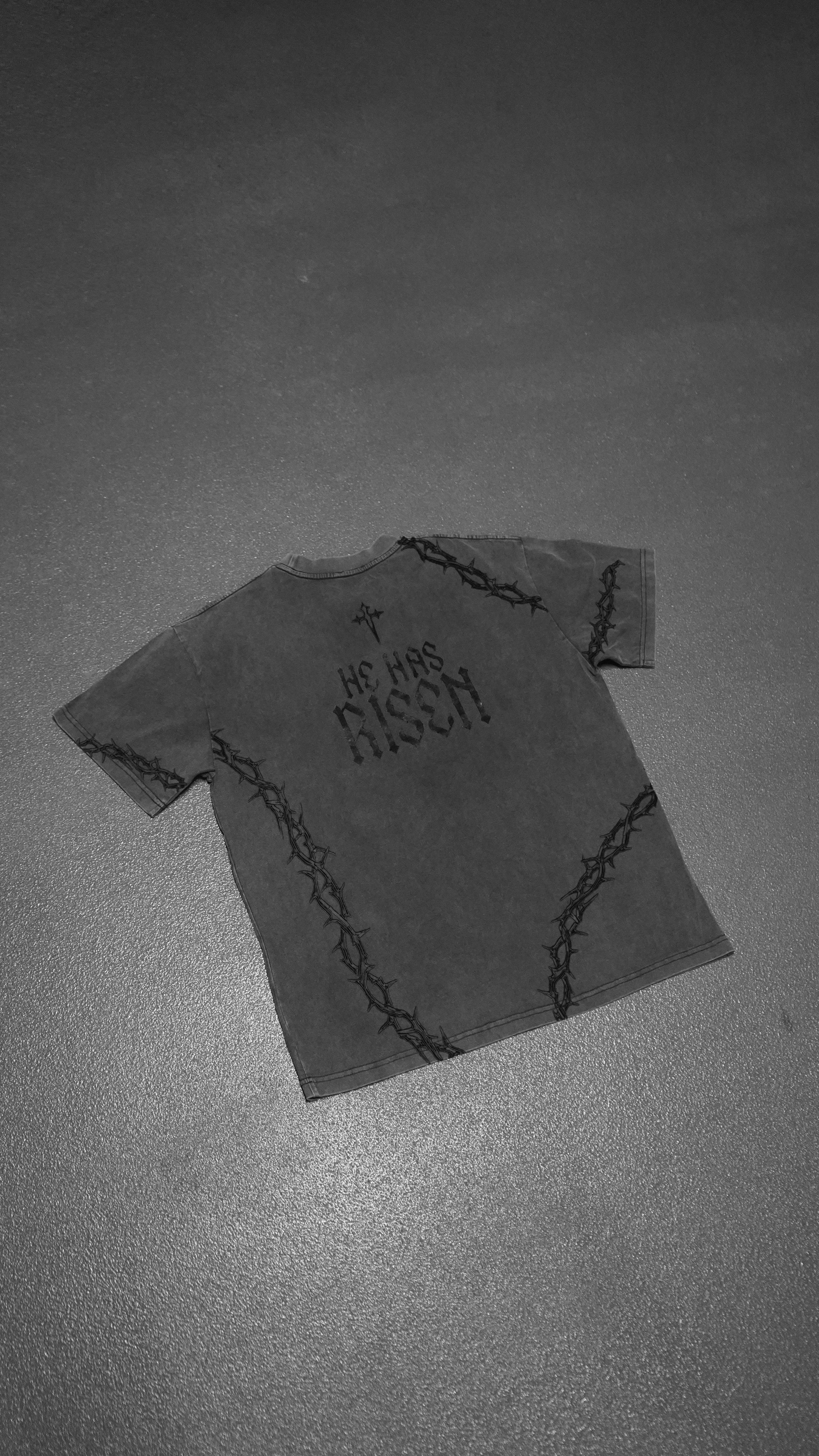 Saint Kaizen Christian gym wear shirt. Features the bold Risen T-Shirt - Black spiritual design. Oversize fit made from premium 220gr cotton.