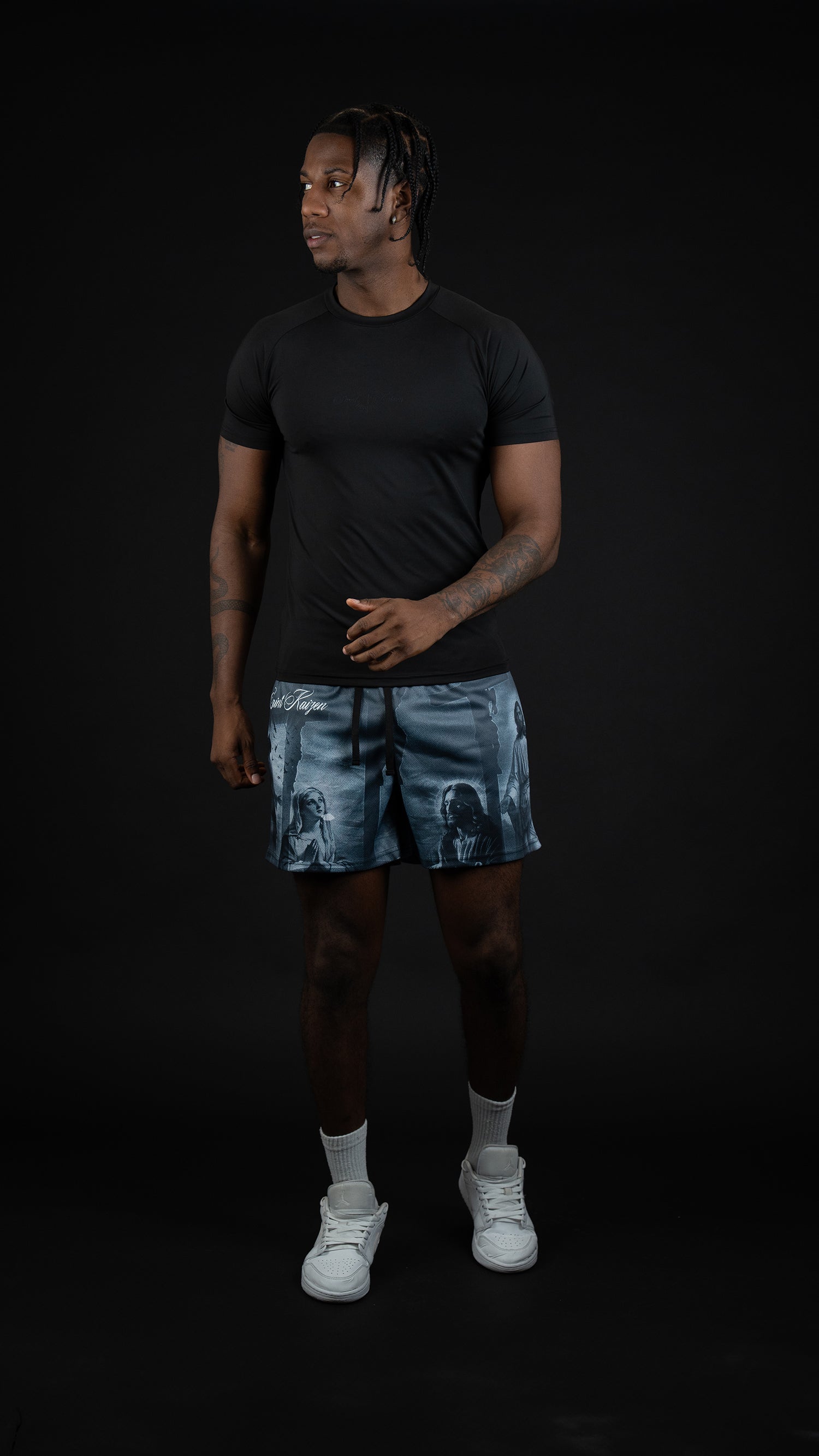 Saint Kaizen Christian gym wear Sacred Journey Shorts. Lightweight 100% polyester mesh with bold printed spiritual design. Features a 5-inch inseam for mobility.