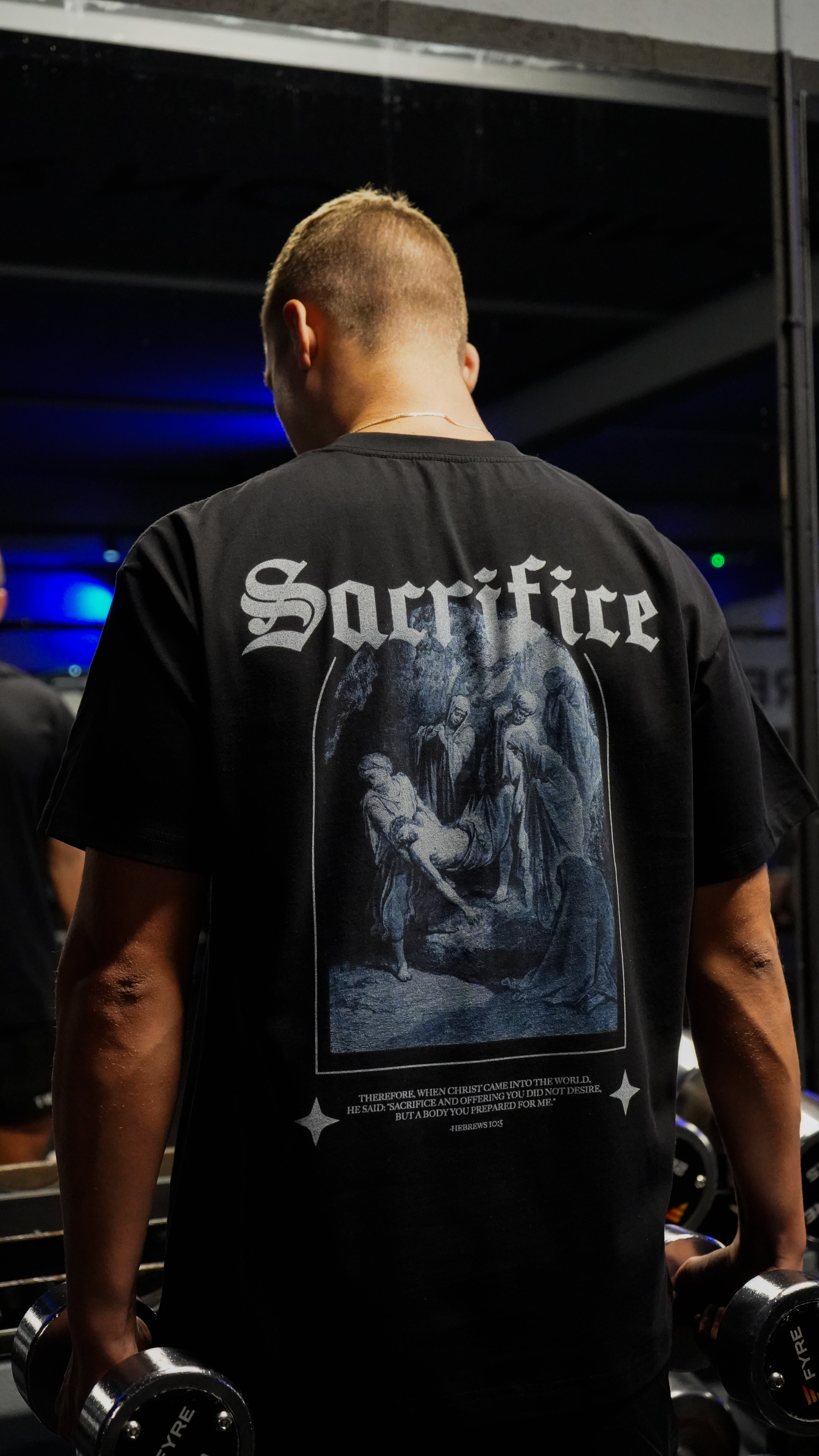 Saint Kaizen Christian gym wear shirt. Features the bold Sacrifice T-Shirt - Black spiritual design. Oversize fit made from premium 220gr cotton.