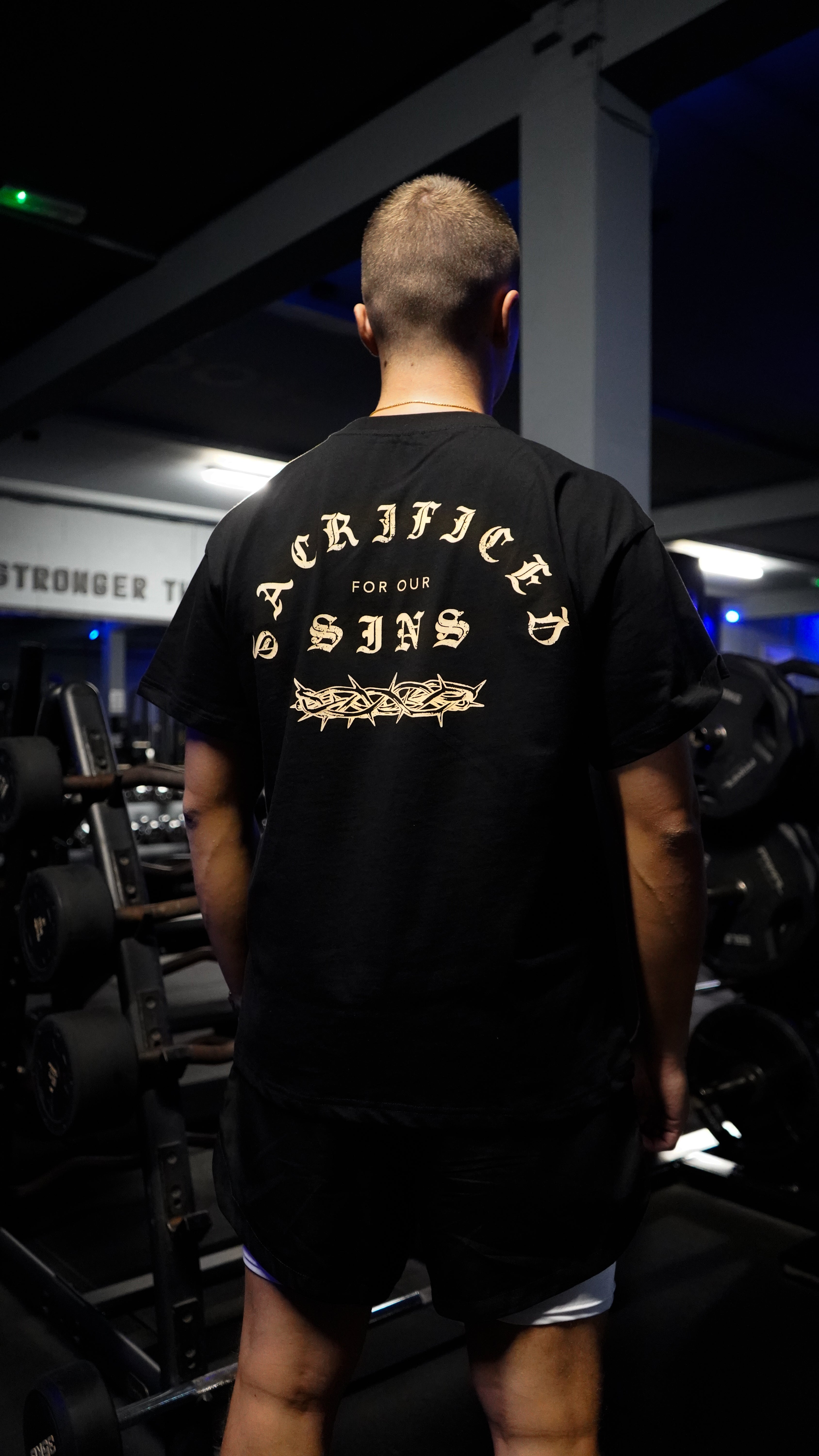 Saint Kaizen Christian gym wear shirt. Features the bold Sacrificed for Our Sins T-Shirt spiritual design. Oversize fit made from premium 220gr cotton.