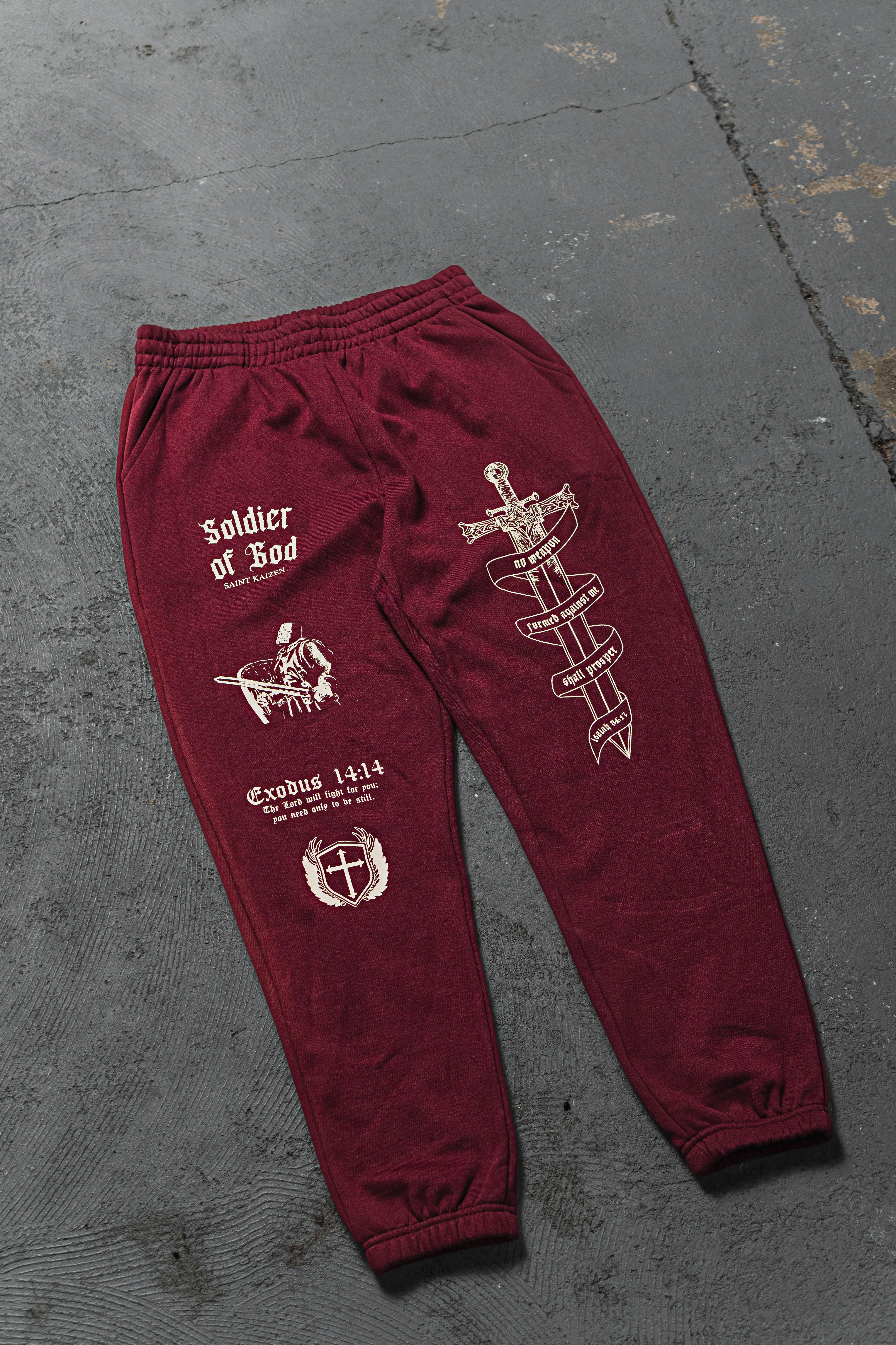 Saint Kaizen Soldier Of God Joggers - Wine. Christian gym wear with high-quality screen print design. Terry fleece lining for warmth and comfort.