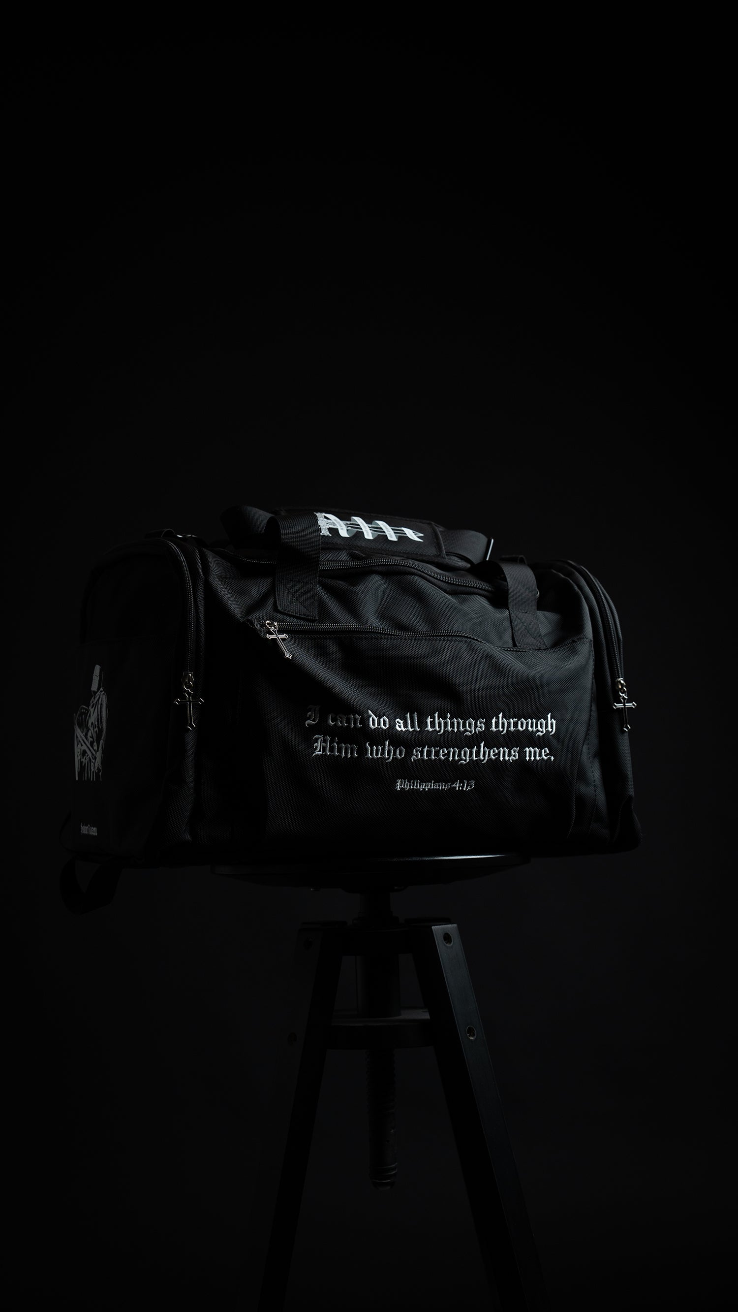 Saint Kaizen Christian gym duffle bag. Features the Soldier of God Duffle Bag verse, powerful spiritual artwork, and detailed embroidery for Christian athletes.