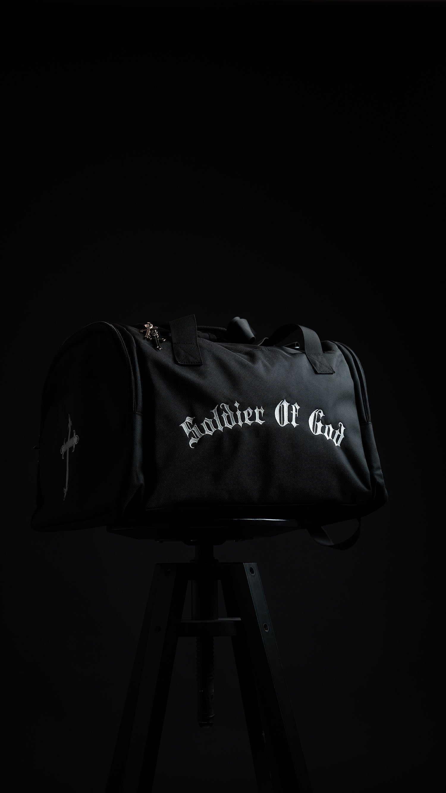 Saint Kaizen Christian gym duffle bag. Features the Soldier of God Duffle Bag verse, powerful spiritual artwork, and detailed embroidery for Christian athletes.