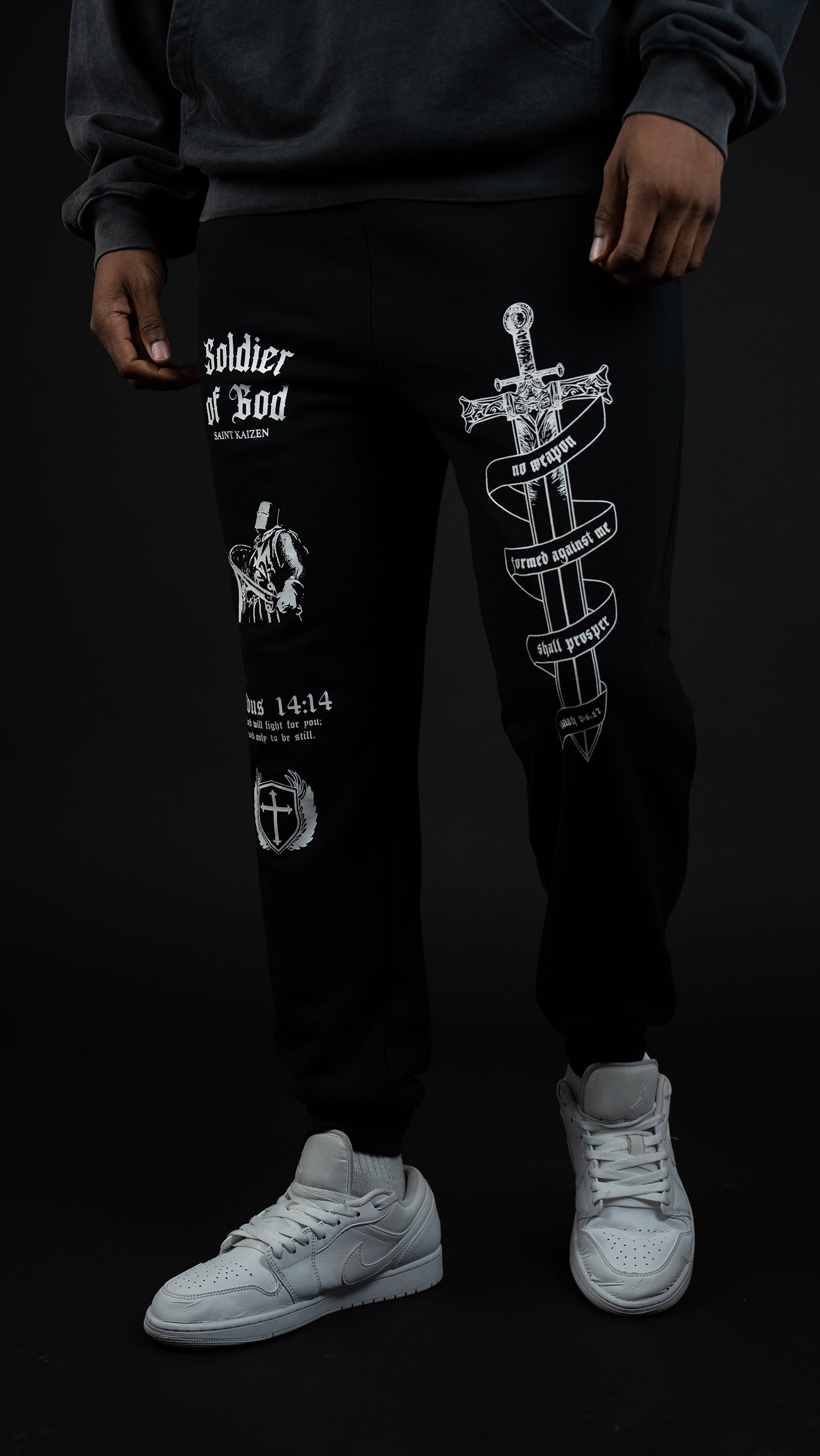 Saint Kaizen Soldier of God Joggers - Black. Christian gym wear with high-quality screen print design. Terry fleece lining for warmth and comfort.