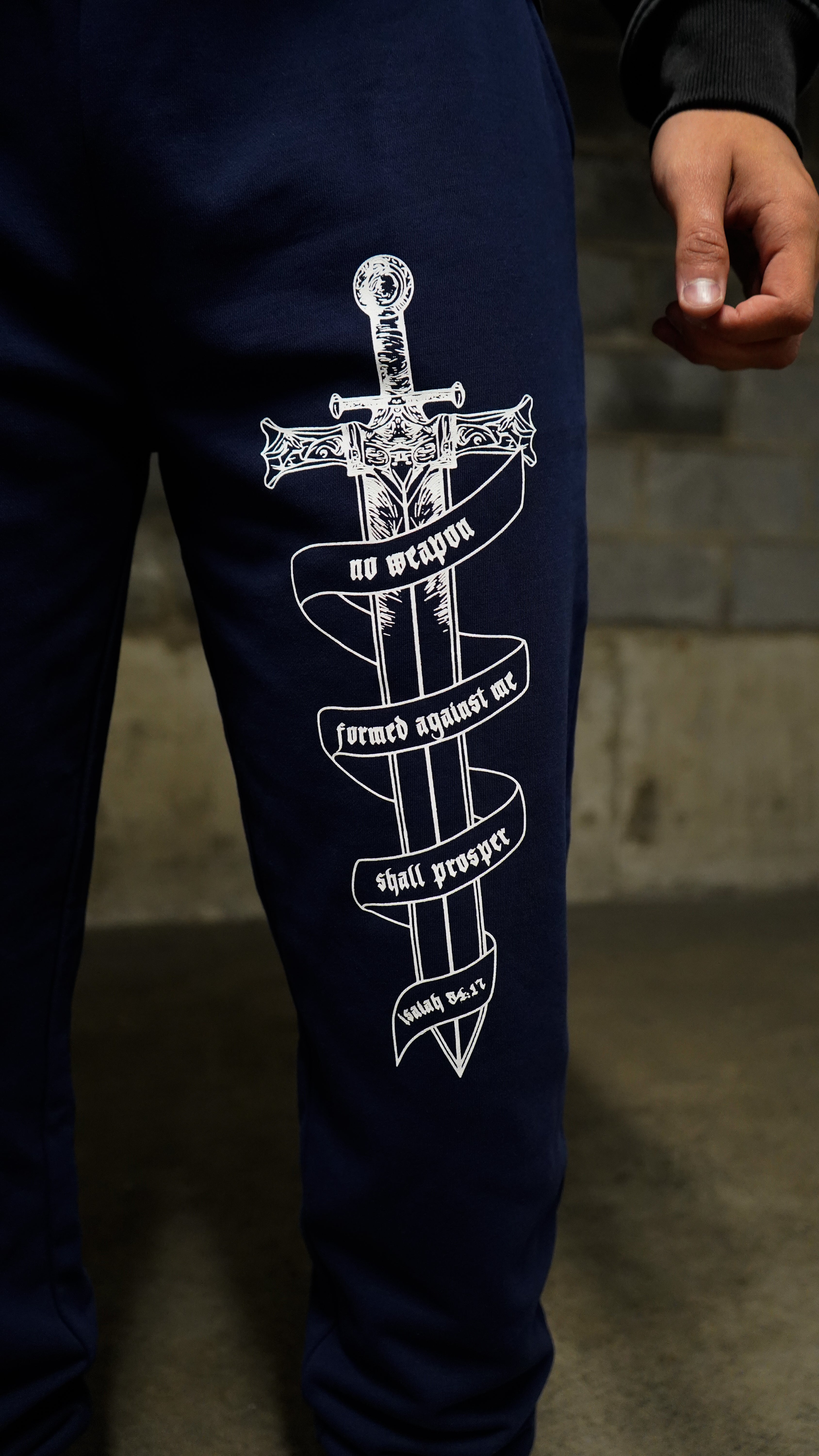 Saint Kaizen Soldier of God Joggers - Navy. Christian gym wear with high-quality screen print design. Terry fleece lining for warmth and comfort.