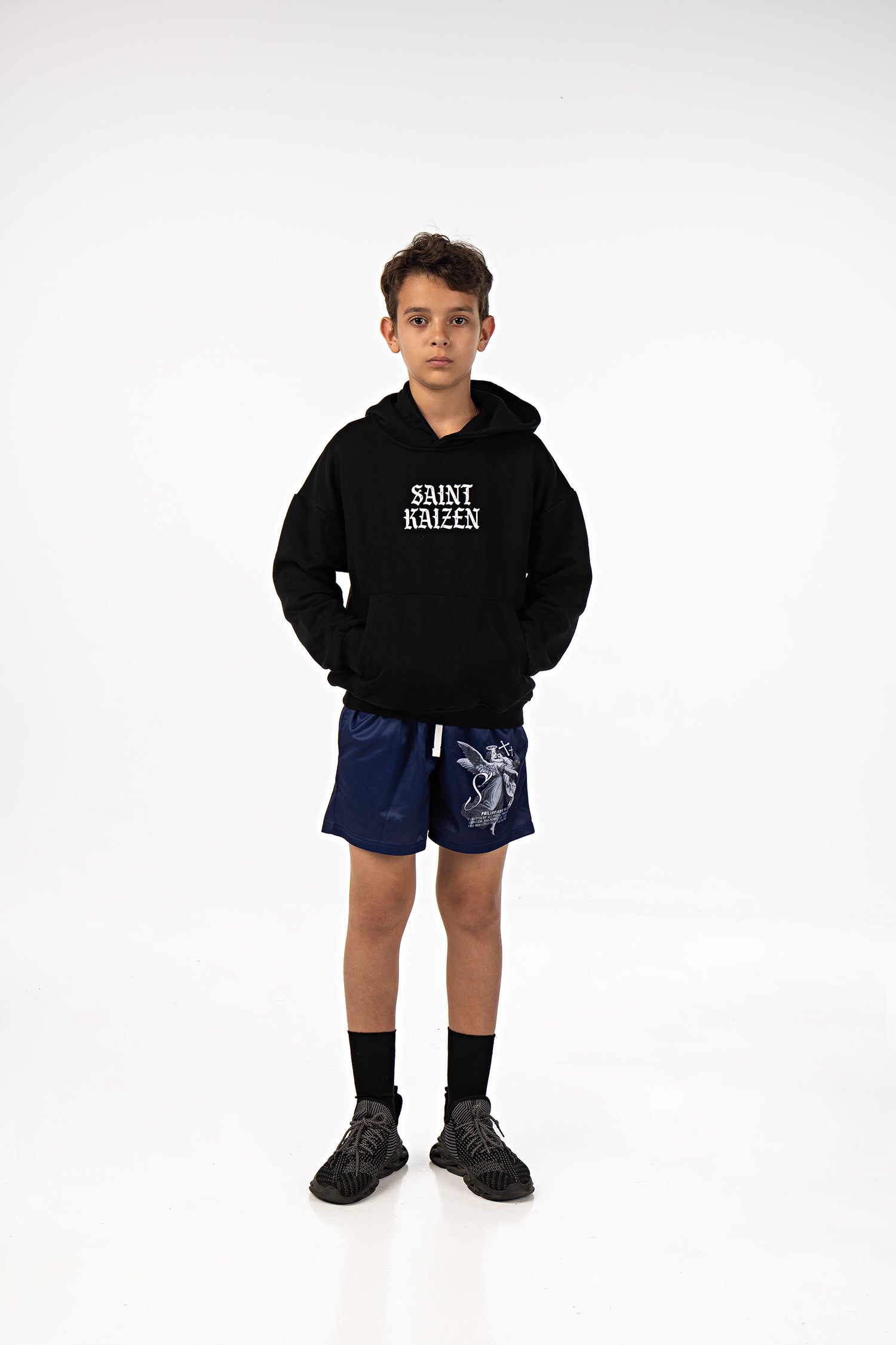 Saint Kaizen Christian gym wear Strength Through Christ Youth Mesh Shorts - Blue. Lightweight 100% polyester mesh with bold printed spiritual design. Features a 5-inch inseam for mobility.