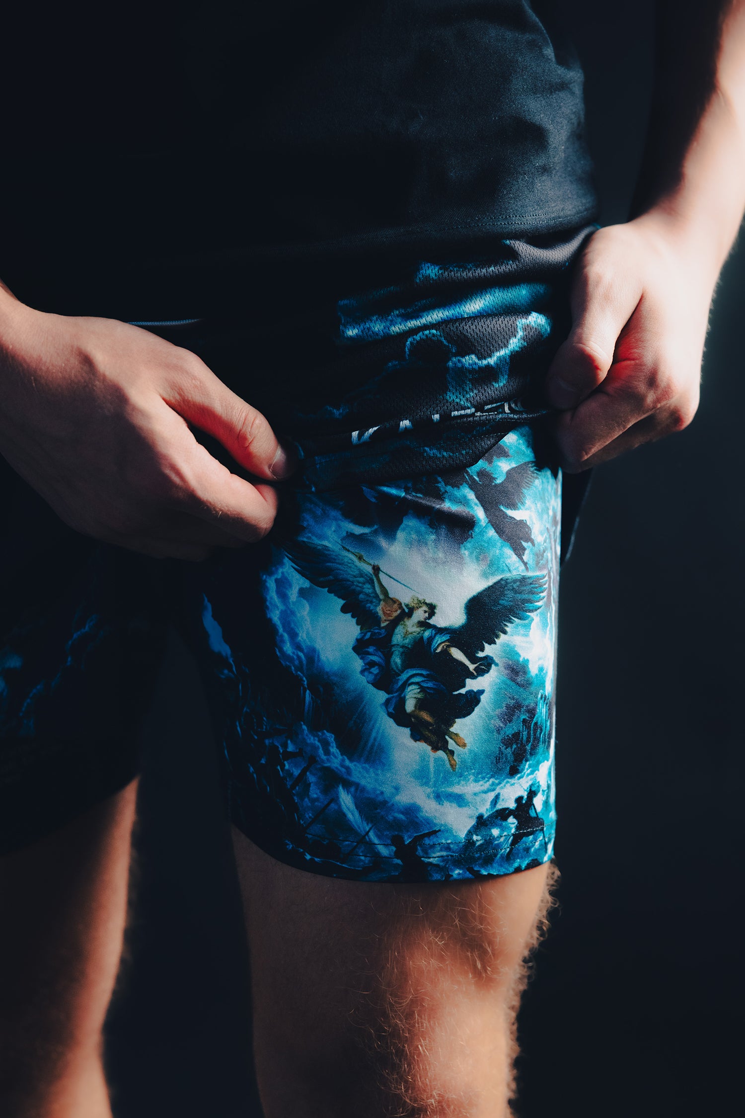Saint Kaizen Christian gym wear Archangel Gabriel Performance Shorts. Two-layer shorts built for optimal mobility, featuring secure pockets and premium fabric.