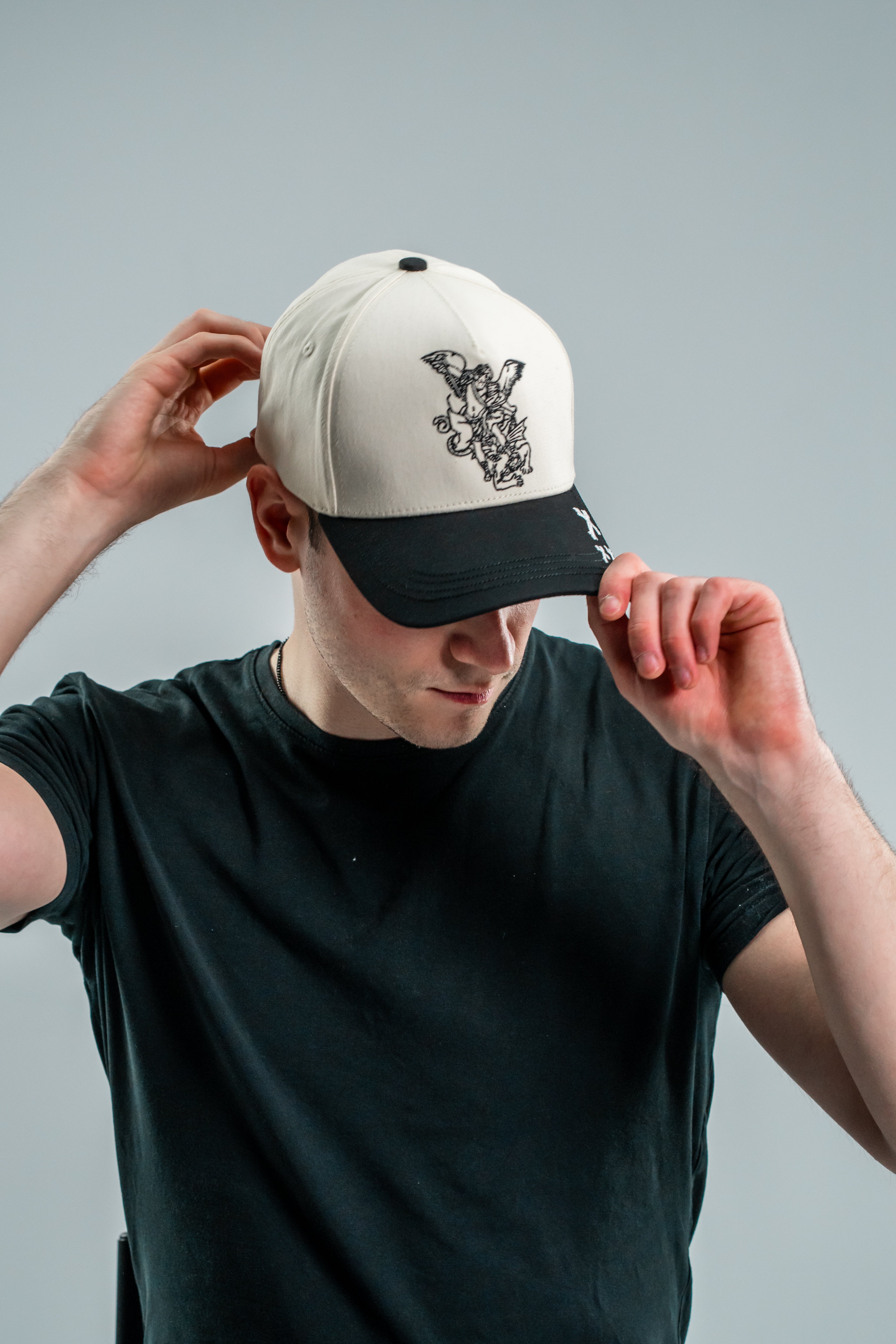 Saint Kaizen premium Christian gym wear [Archangel Michael Cap]. Features bold spiritual Artwork, A comfortable cap designed for both the gym and casual wear.
