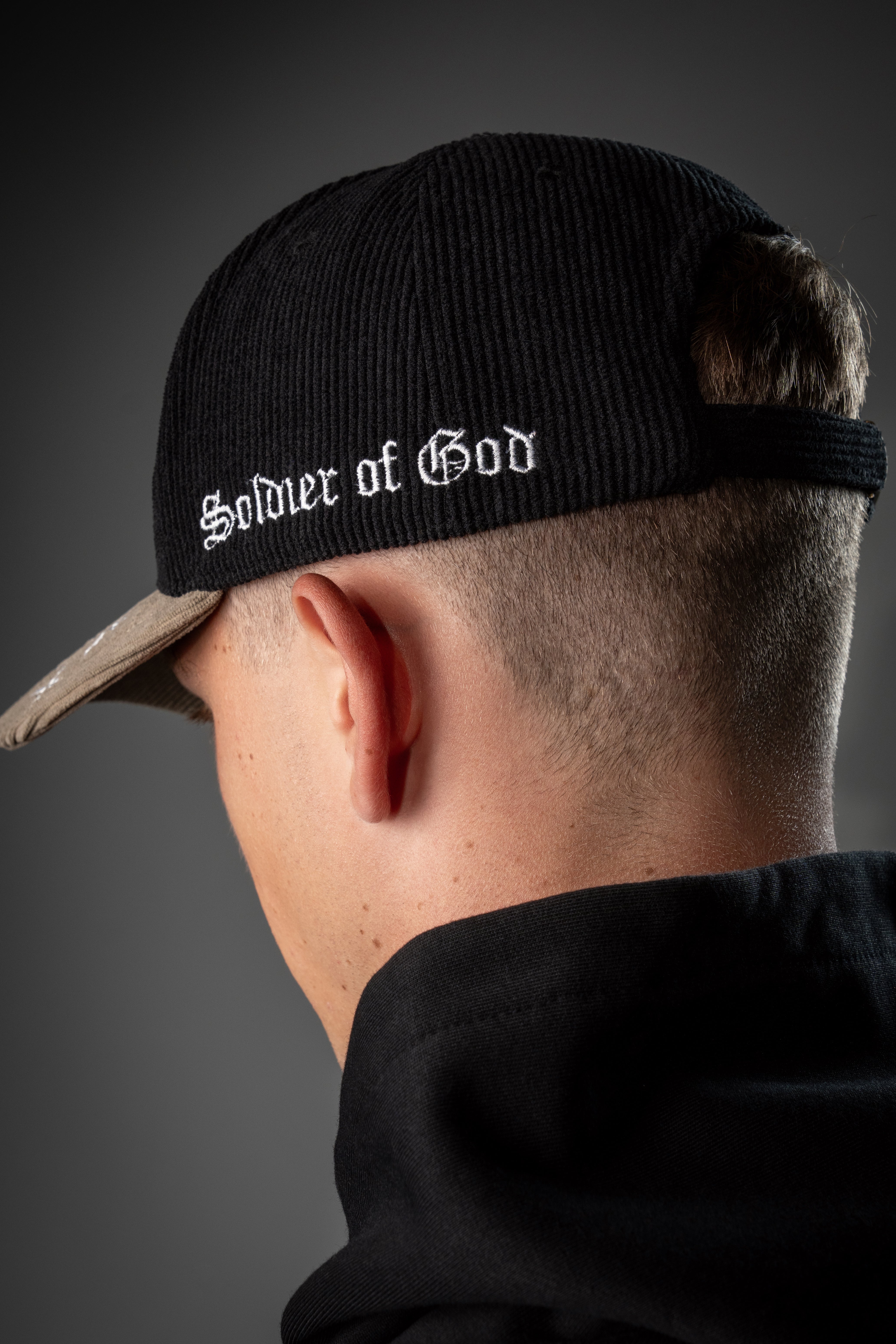 Saint Kaizen premium Christian gym wear [Archangel Michael Cap - Black and Cream]. Features bold spiritual Artwork, A comfortable cap designed for both the gym and casual wear.