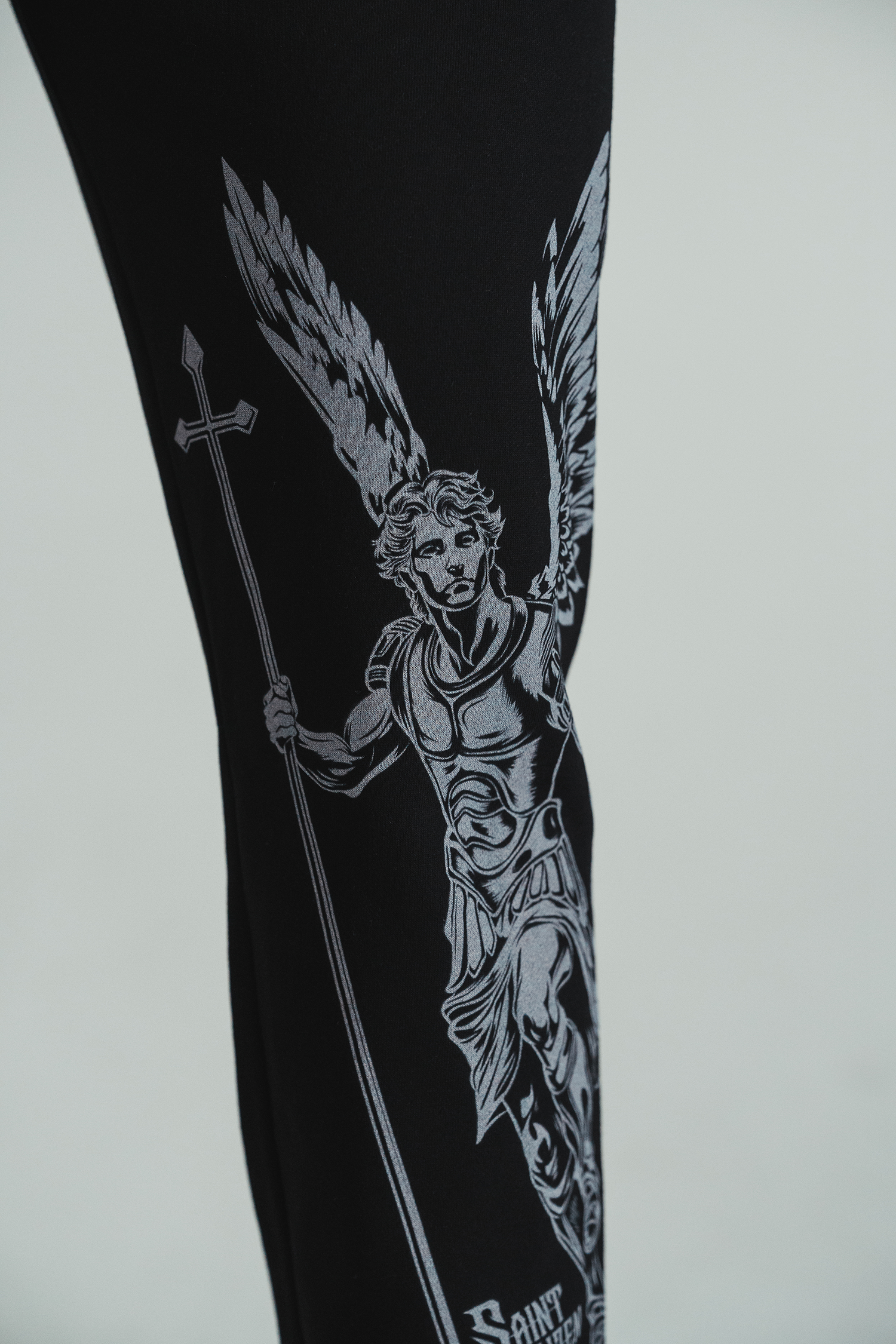 Saint Kaizen Archangel Michael Joggers - Black. Christian gym wear with high-quality screen print design. Terry fleece lining for warmth and comfort.