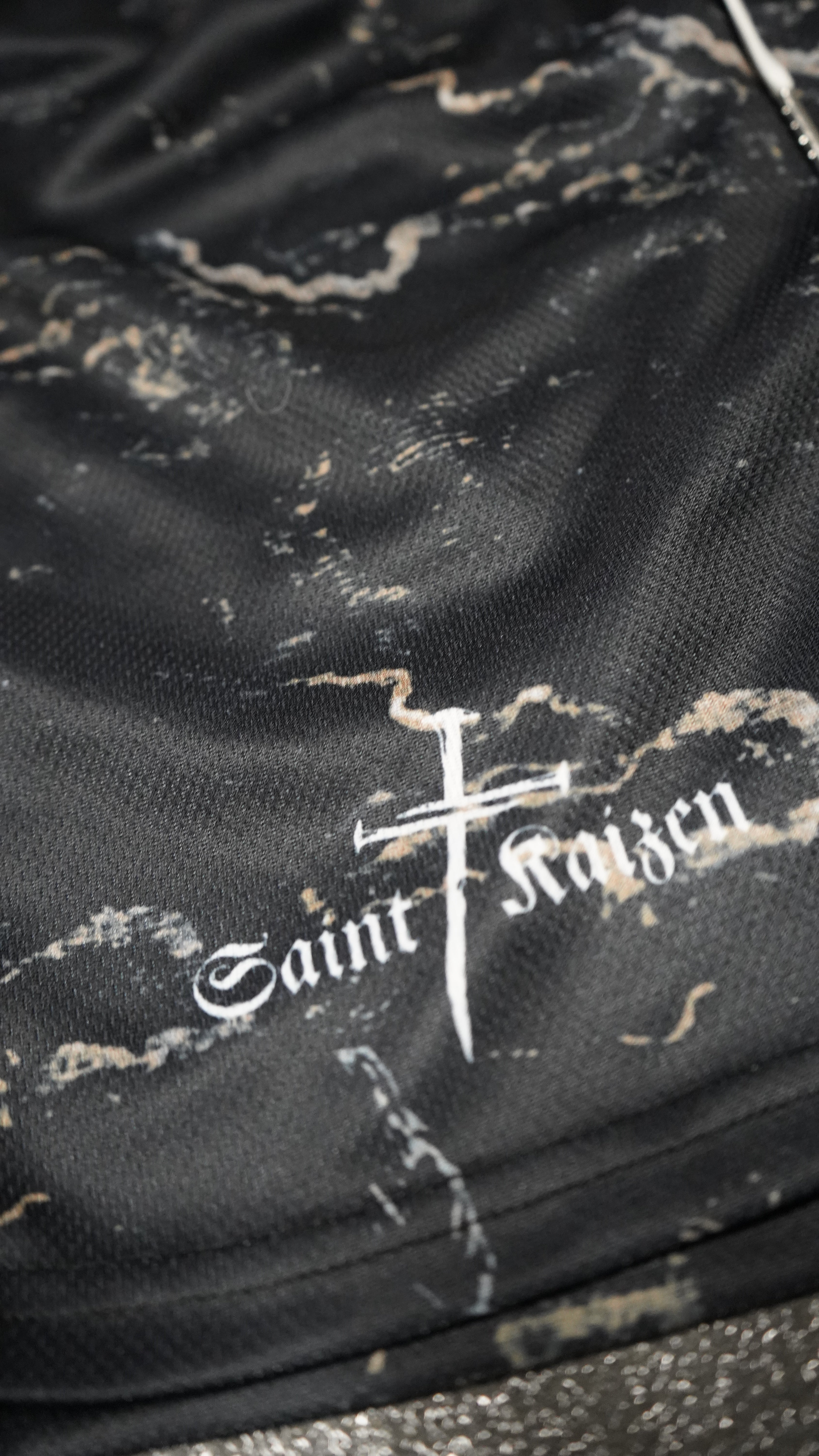 Saint Kaizen Christian gym wear Cross Camo Shorts. Lightweight 100% polyester mesh with bold printed spiritual design. Features a 5-inch inseam for mobility.