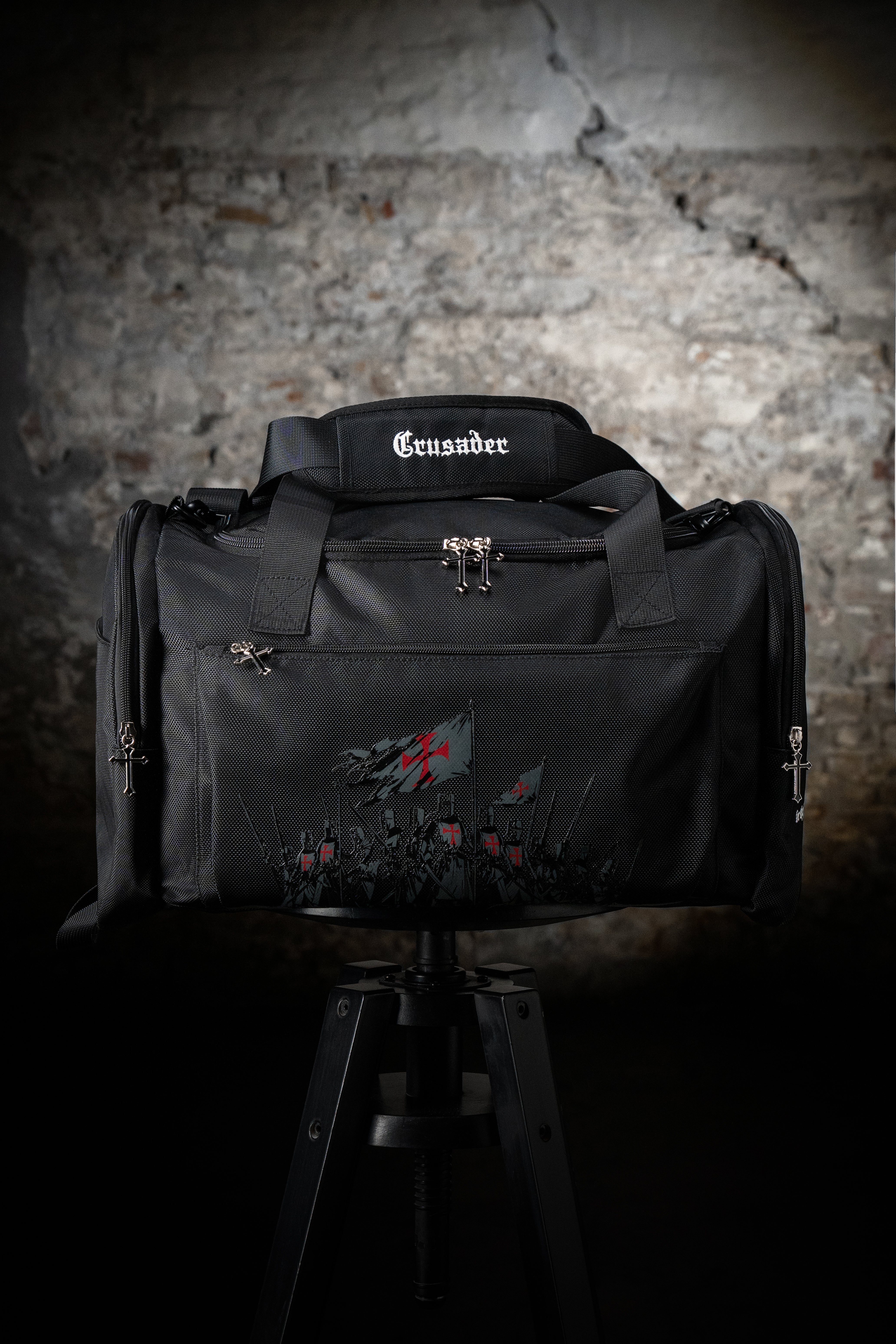 Saint Kaizen Christian gym duffle bag. Features the Crusader Duffle Bag verse, powerful spiritual silk print artwork, and detailed embroidery for Christian athletes