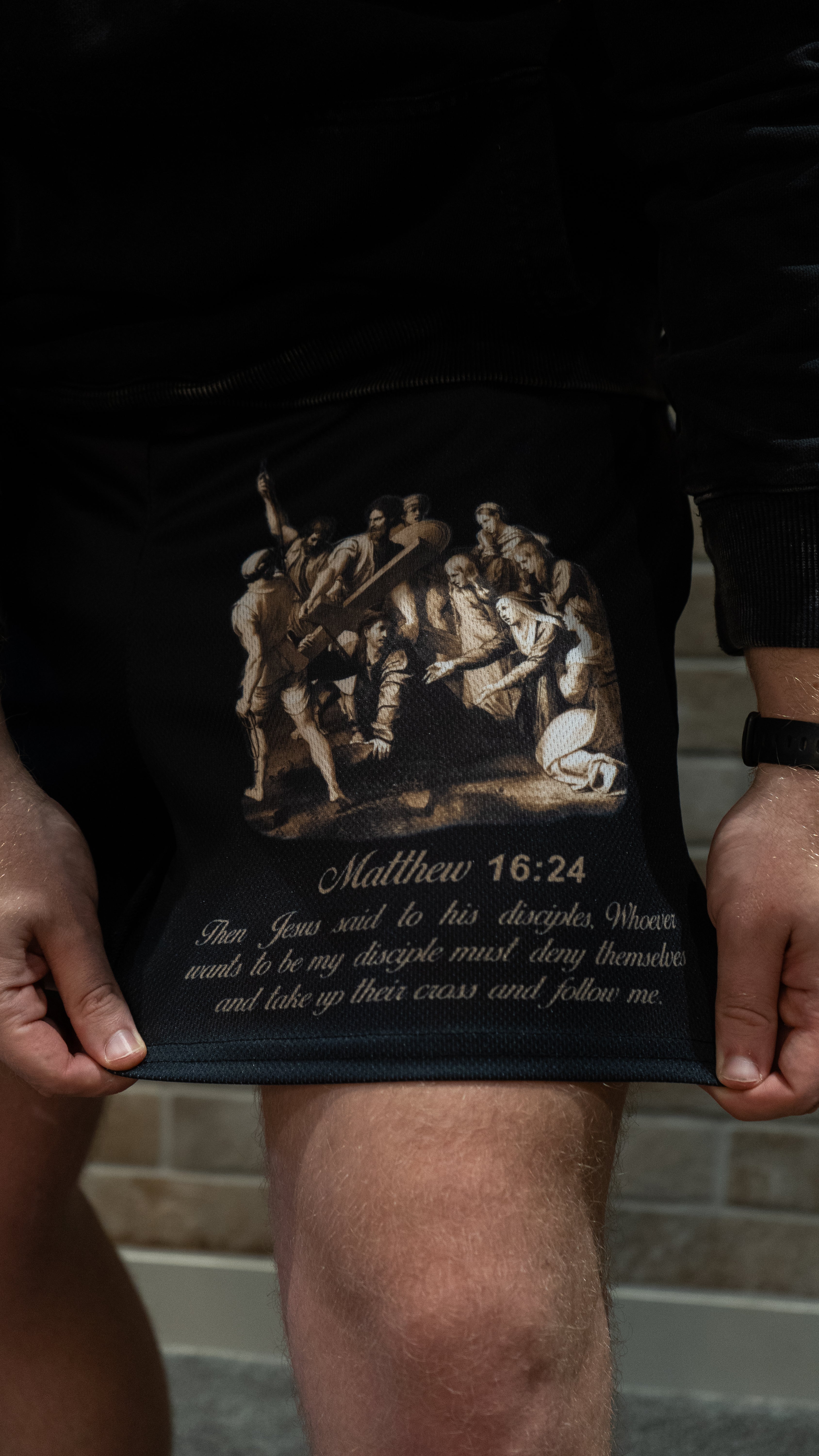 Christian-themed mesh gym shorts with Bible verses, made from 100% polyester, featuring double side pockets and a 5-inch inseam for comfort and mobility.