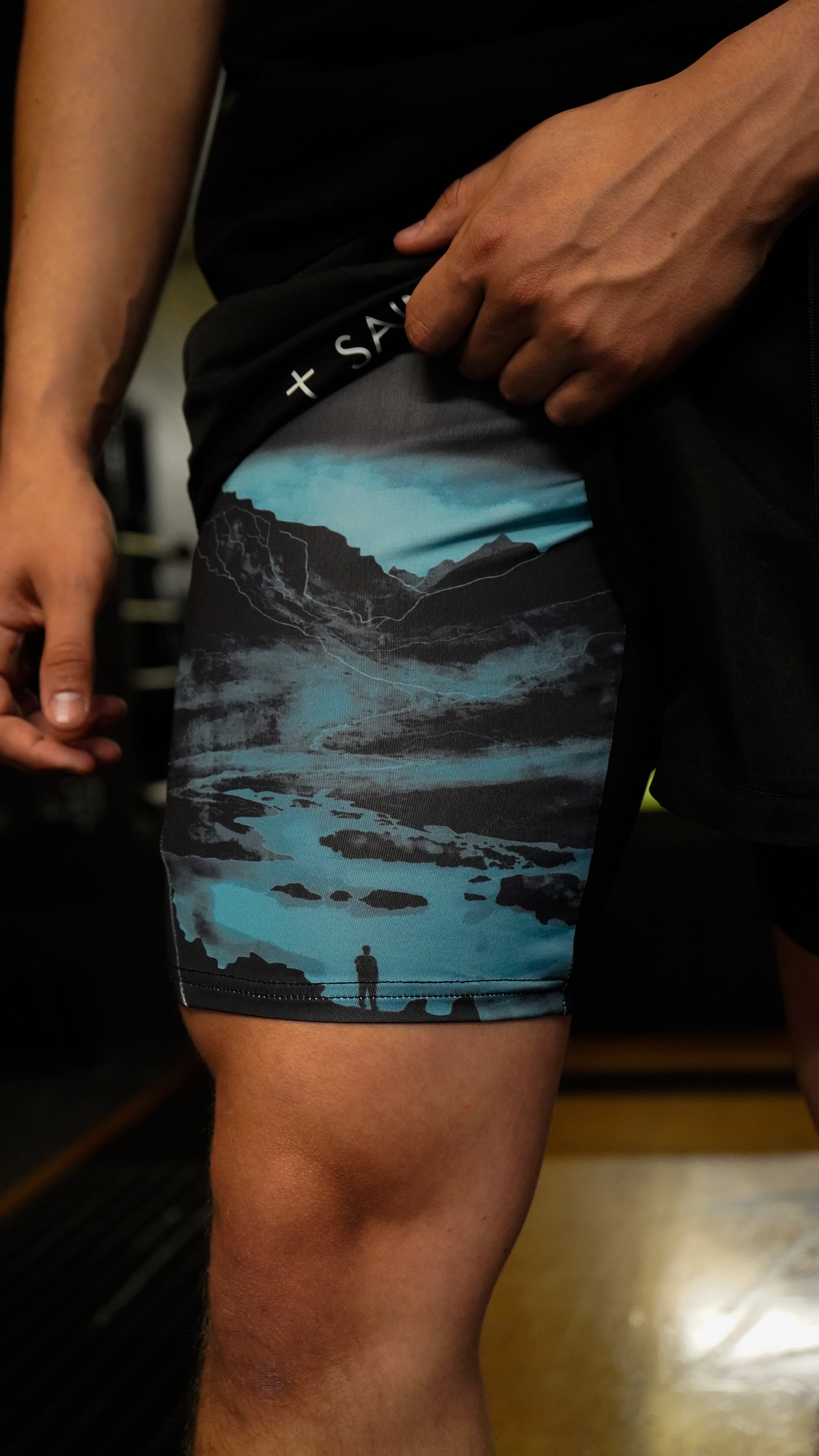 Christian-themed performance shorts with Bible verses, made from a blend of cotton and polyester with a spandex inner lining, featuring Saint Kaizen screen print and multiple pockets for convenience.