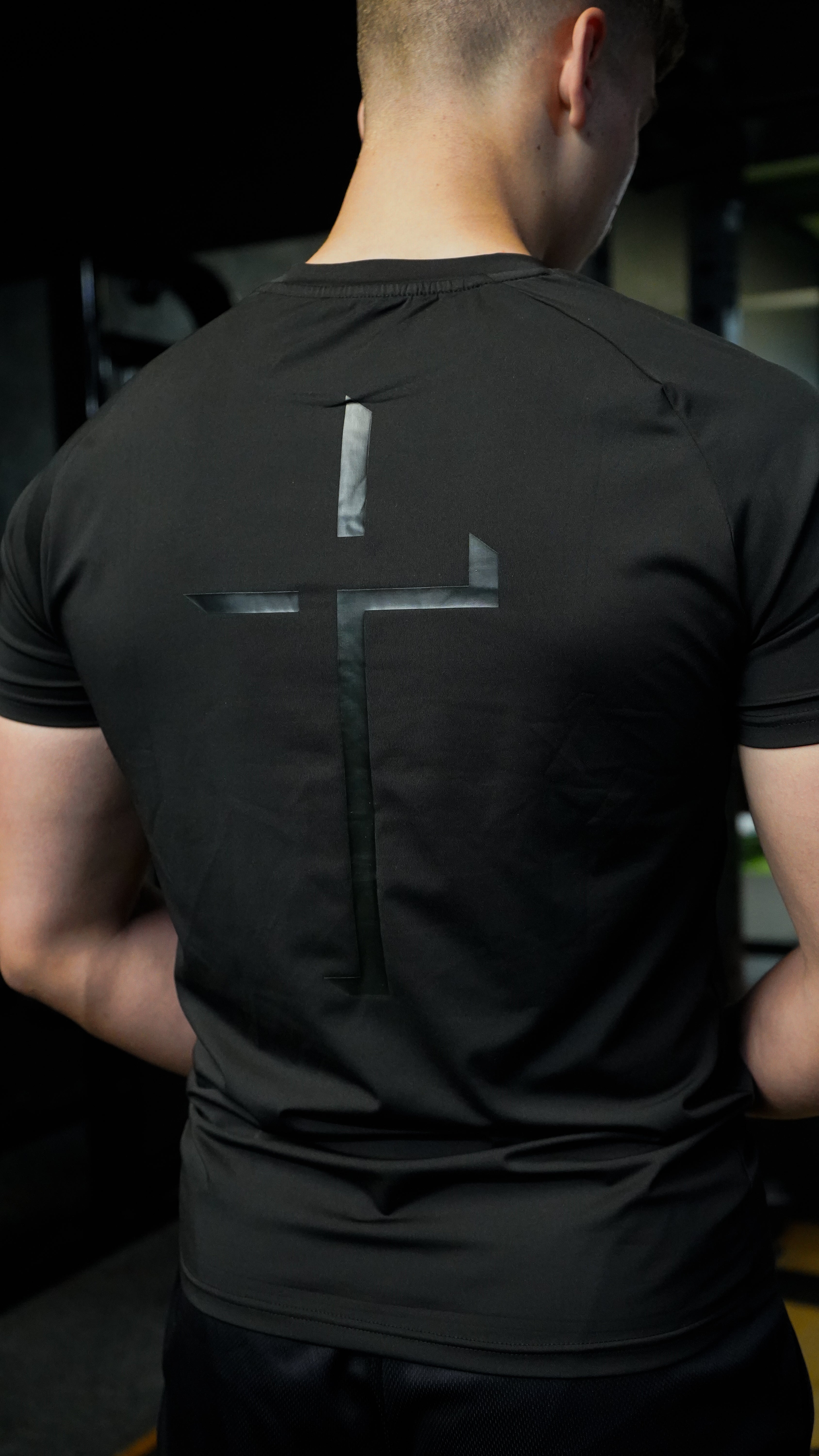 Christian-themed Compression Tee from Gym Wear, featuring gentle compression, moisture-wicking technology, and a second-skin feel for optimal performance and comfort during workouts.