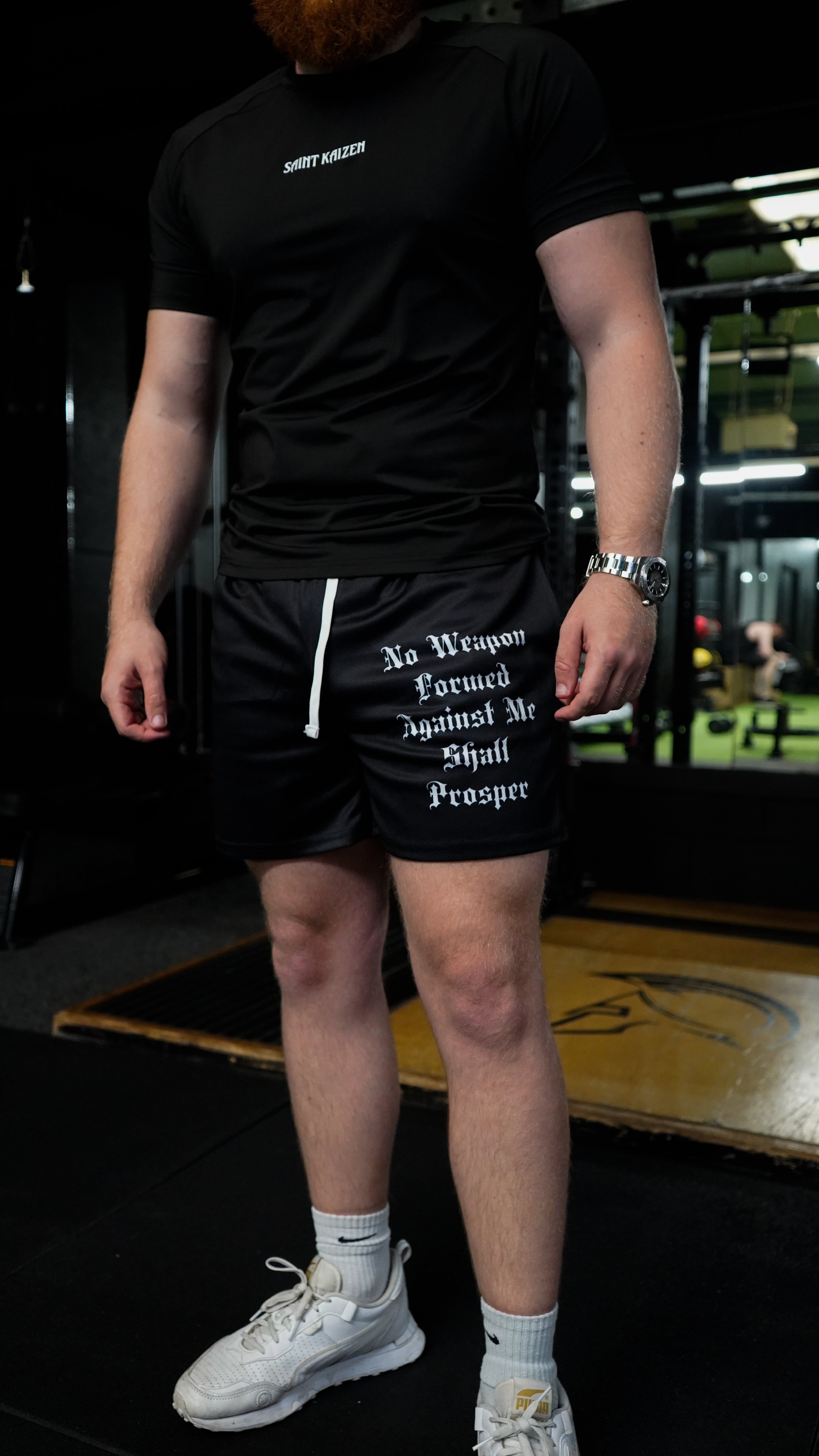 Christian-themed mesh gym shorts with Bible verses, made from 100% polyester, featuring double side pockets and a 5-inch inseam for comfort and mobility.