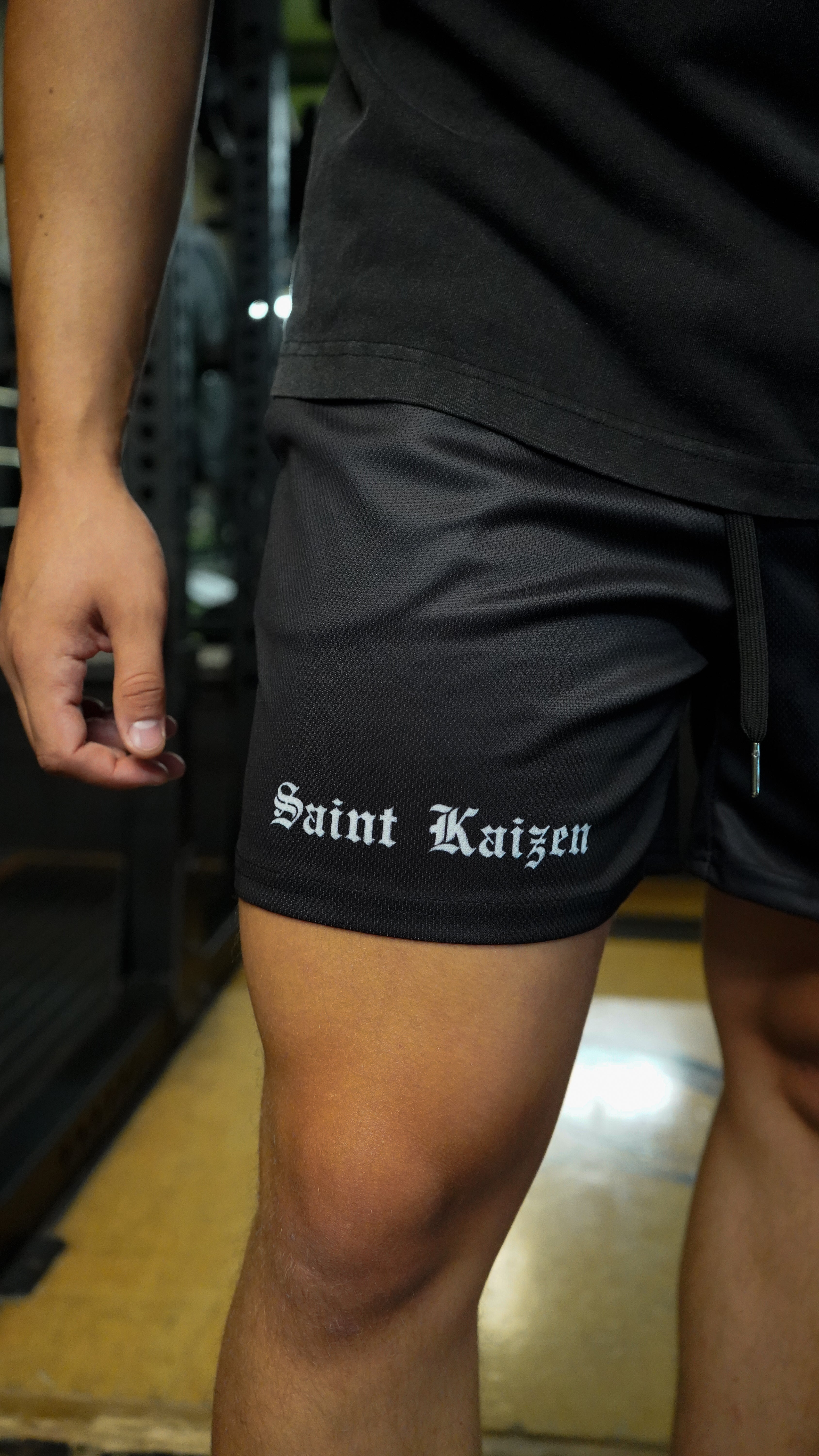 Christian-themed mesh gym shorts with Bible verses, made from 100% polyester, featuring double side pockets and a 5-inch inseam for comfort and mobility.