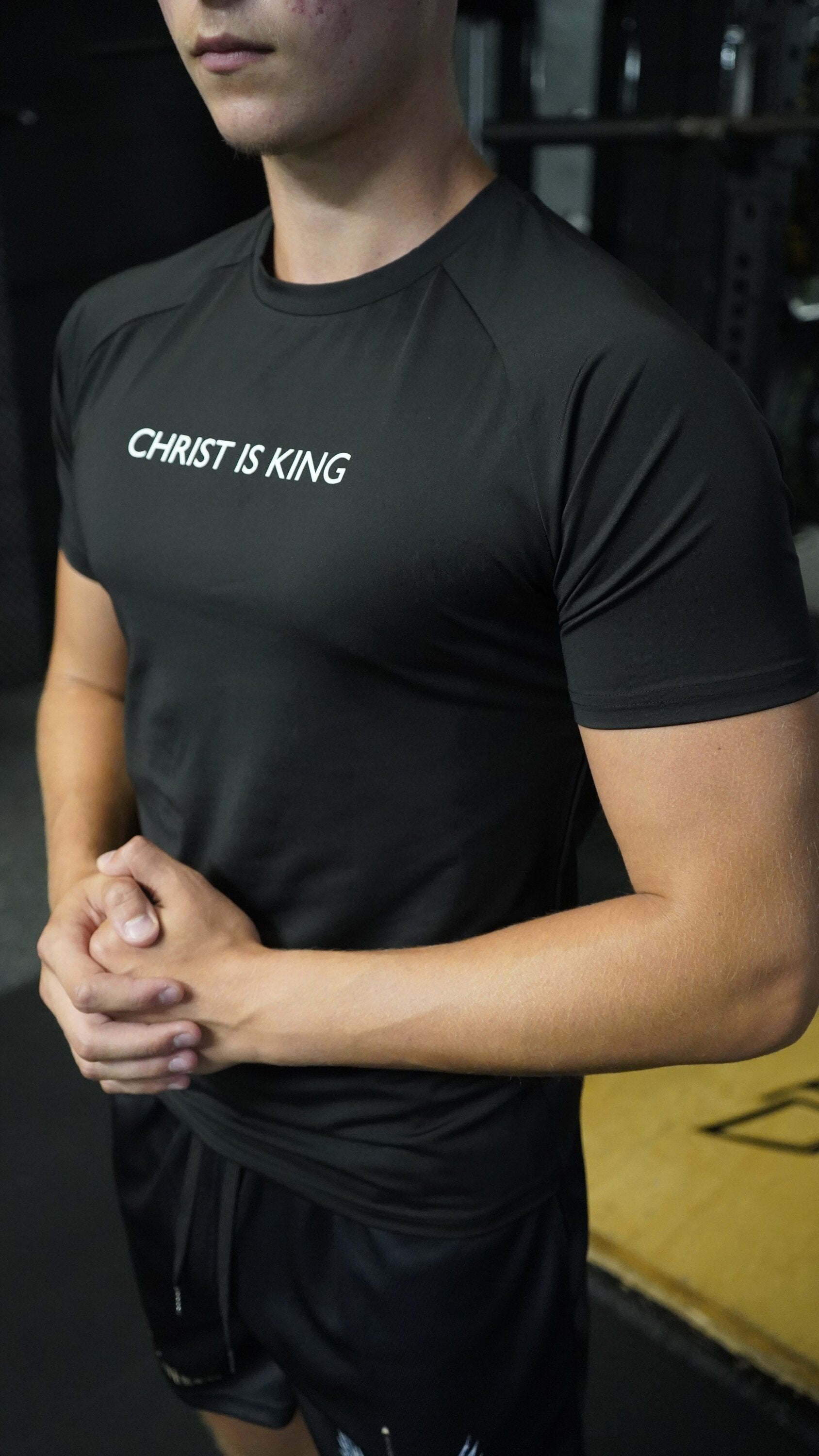 Christian-themed Compression Tee from Gym Wear, featuring gentle compression, moisture-wicking technology, and a second-skin feel for optimal performance and comfort during workouts.