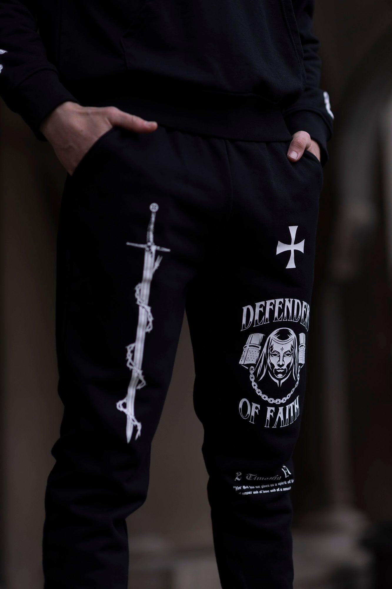 Saint Kaizen Defender Of Faith Joggers. Christian gym wear with high-quality screen print design. Terry fleece lining for warmth and comfort.