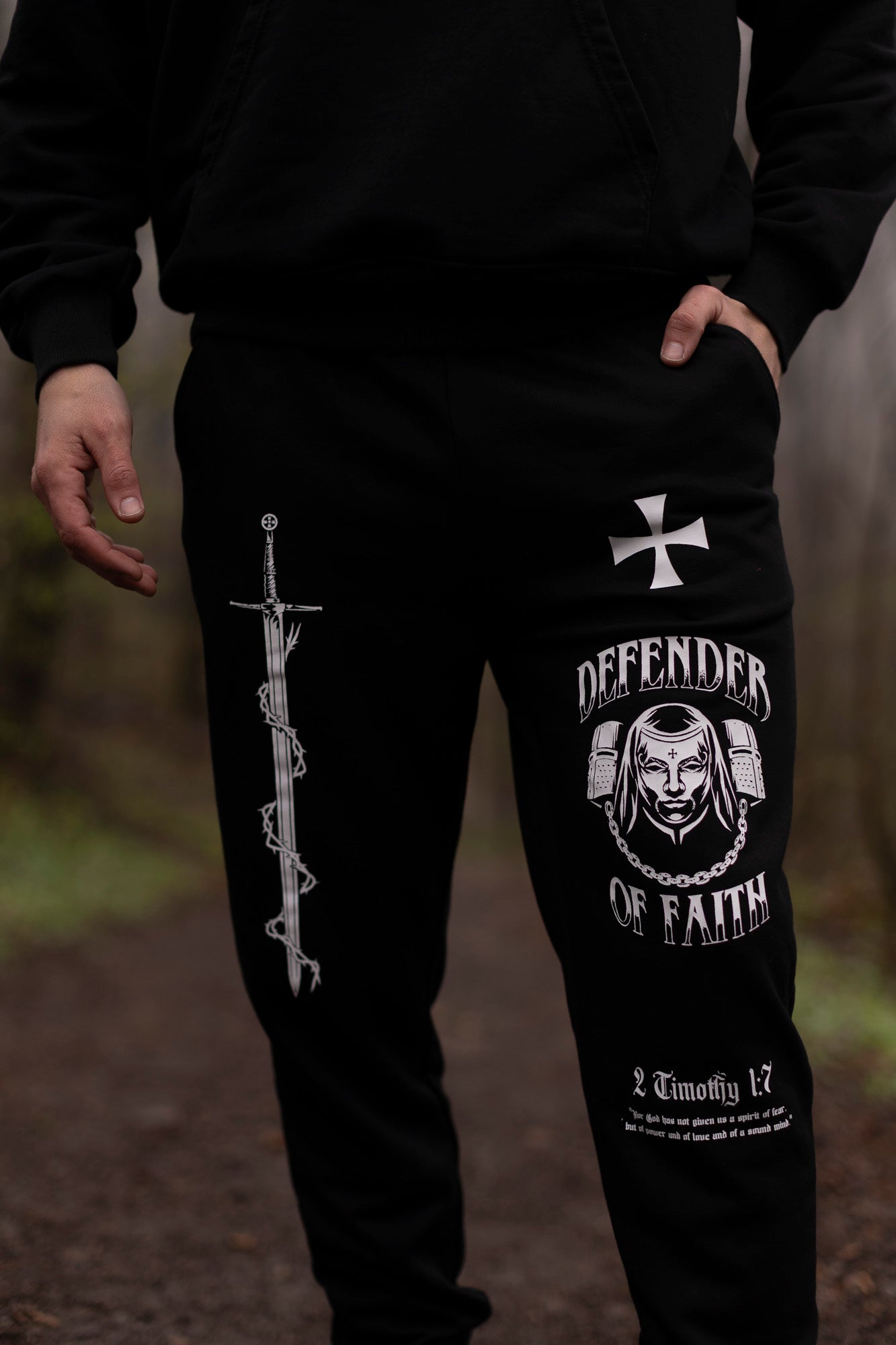 Saint Kaizen Defender Of Faith Joggers. Christian gym wear with high-quality screen print design. Terry fleece lining for warmth and comfort.