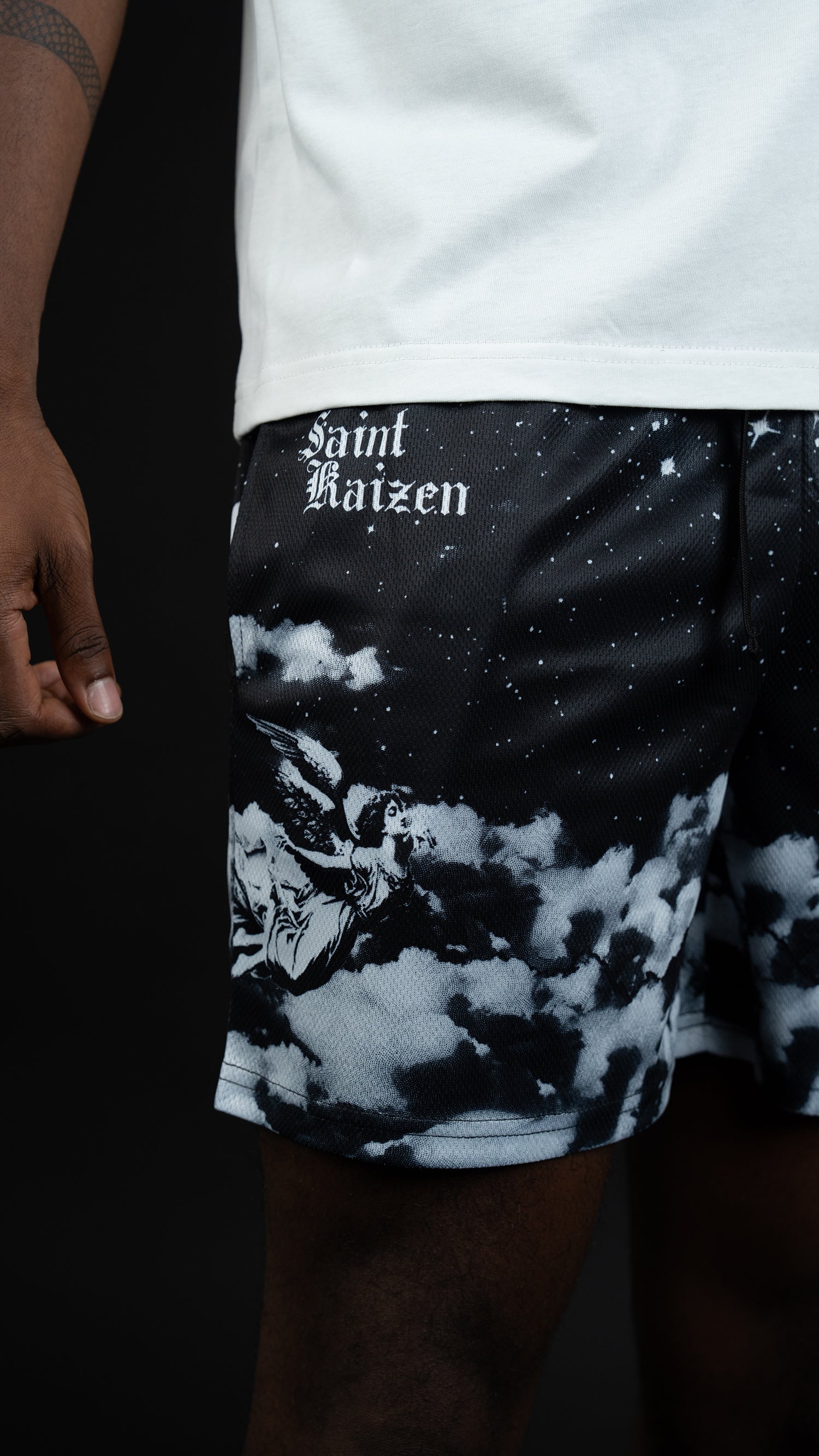 Saint Kaizen Christian gym wear Divine Sky Shorts. Lightweight 100% polyester mesh with bold printed spiritual design. Features a 5-inch inseam for mobility.