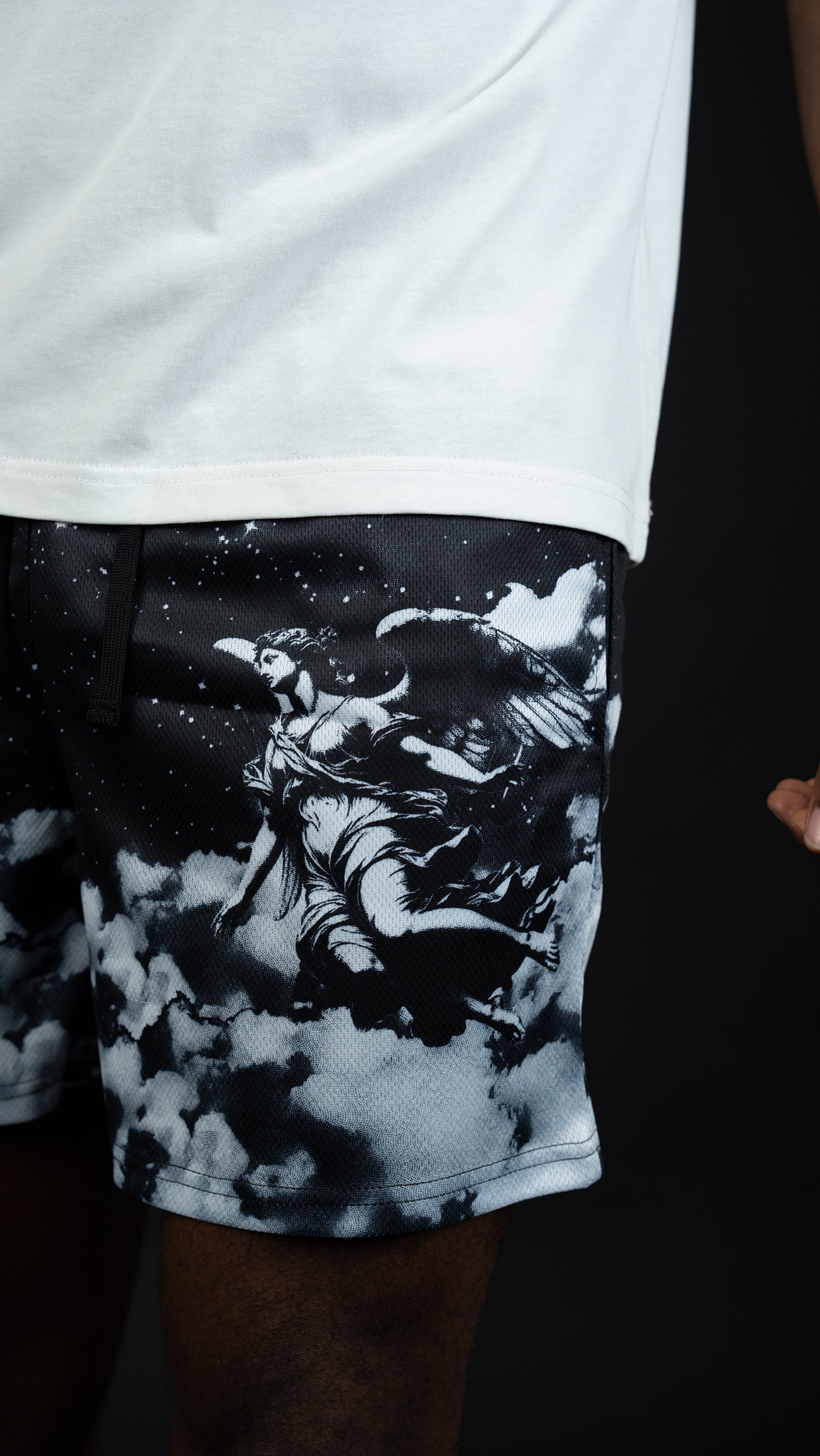 Saint Kaizen Christian gym wear Divine Sky Shorts. Lightweight 100% polyester mesh with bold printed spiritual design. Features a 5-inch inseam for mobility.