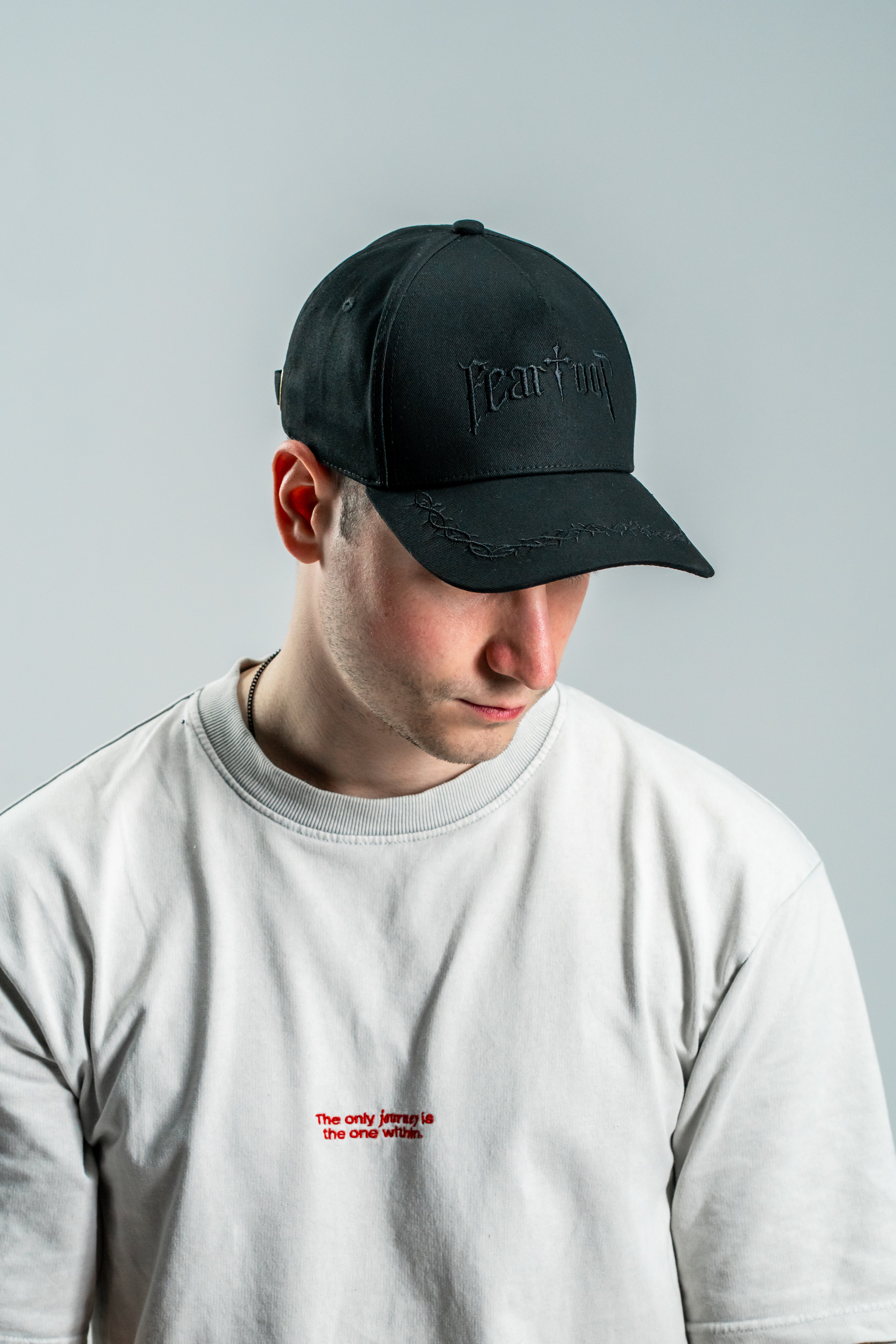 Saint Kaizen premium Christian gym wear [Fear Not Cap]. Features bold spiritual Artwork, A comfortable cap designed for both the gym and casual wear.