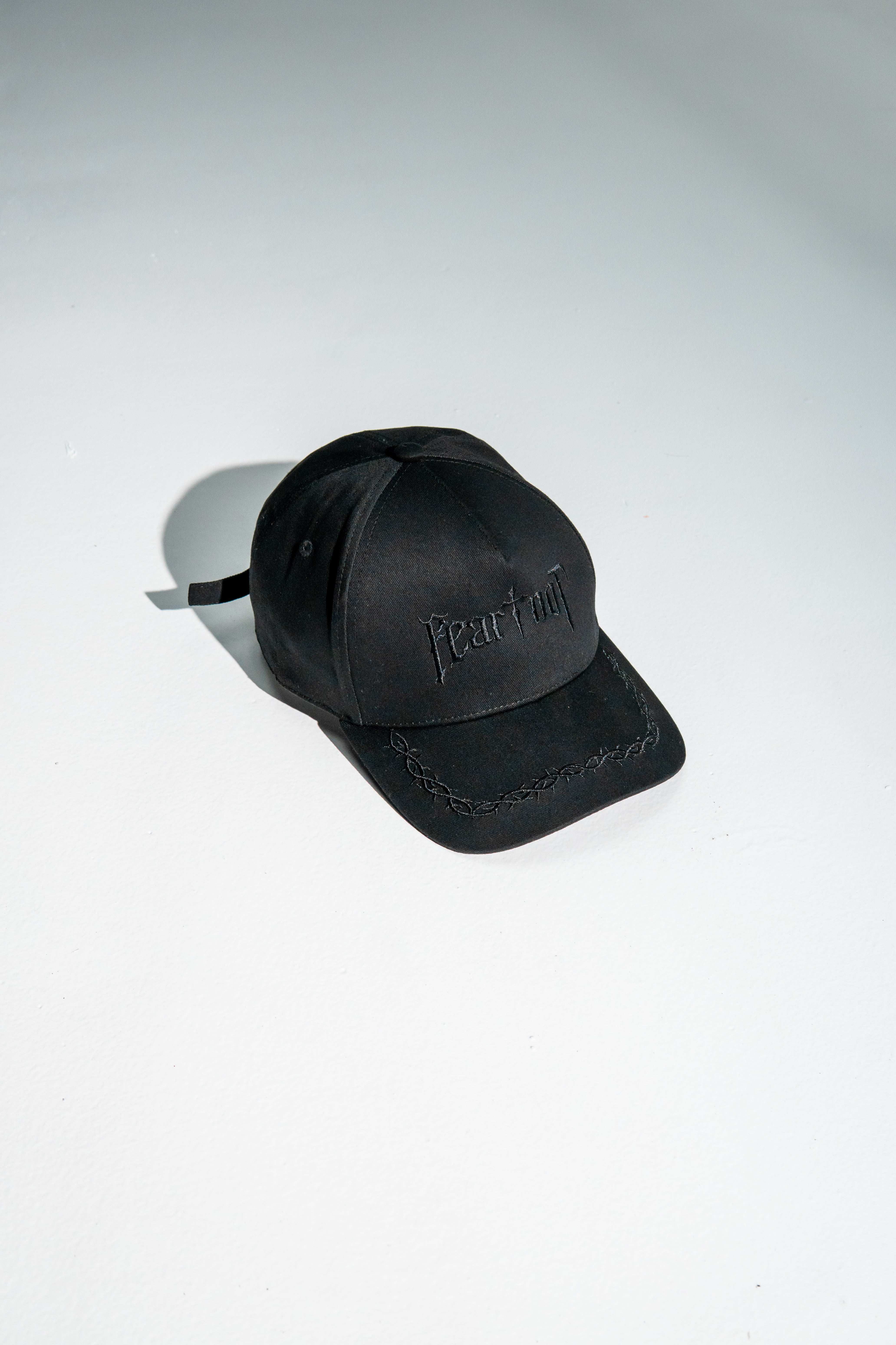 Saint Kaizen premium Christian gym wear [Fear Not Cap]. Features bold spiritual Artwork, A comfortable cap designed for both the gym and casual wear.