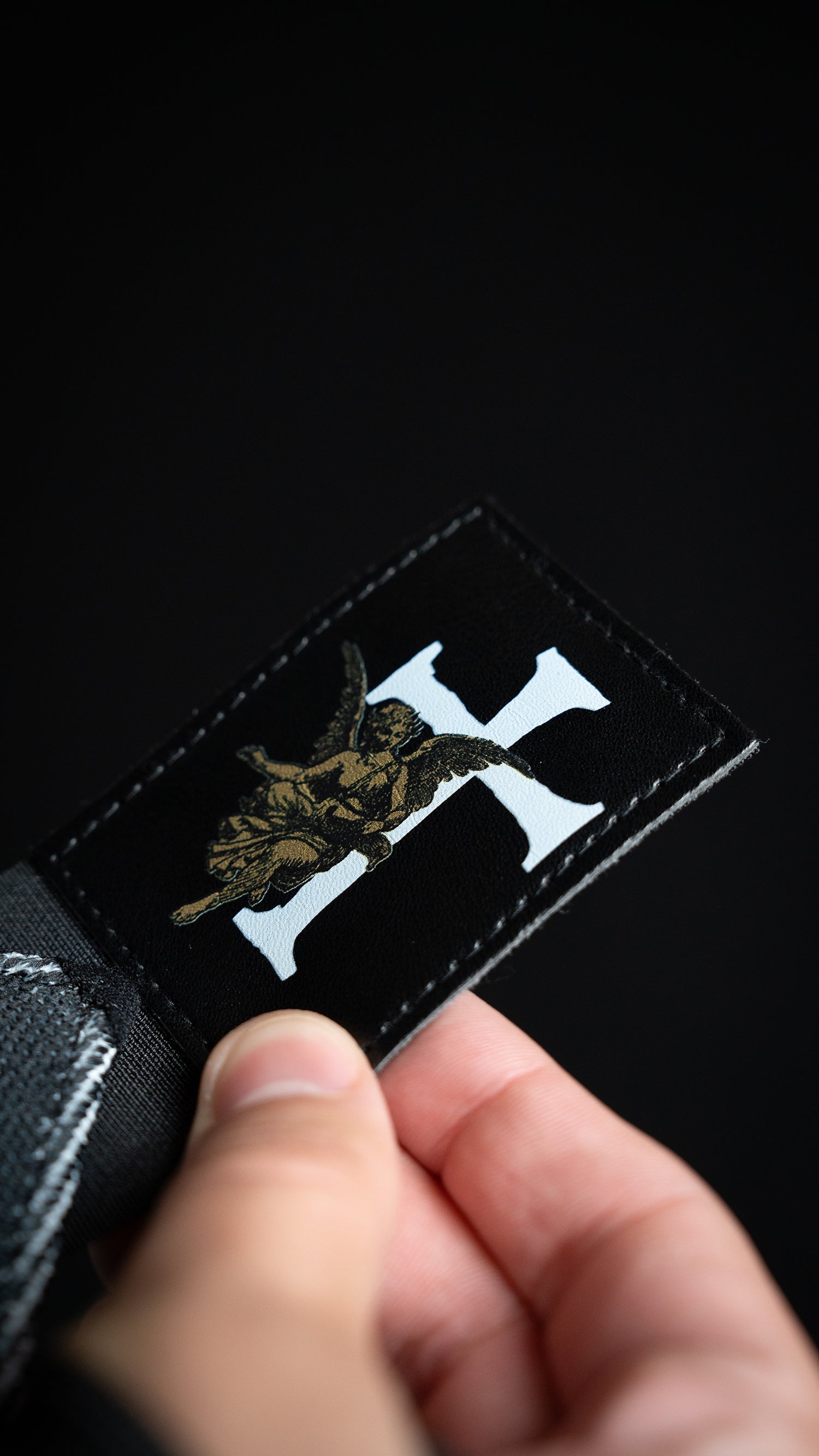 Saint Kaizen Guardian Angels Wrist Wraps. Christian gym wear accessory featuring bold spiritual print and heavy-duty Velcro for stability.