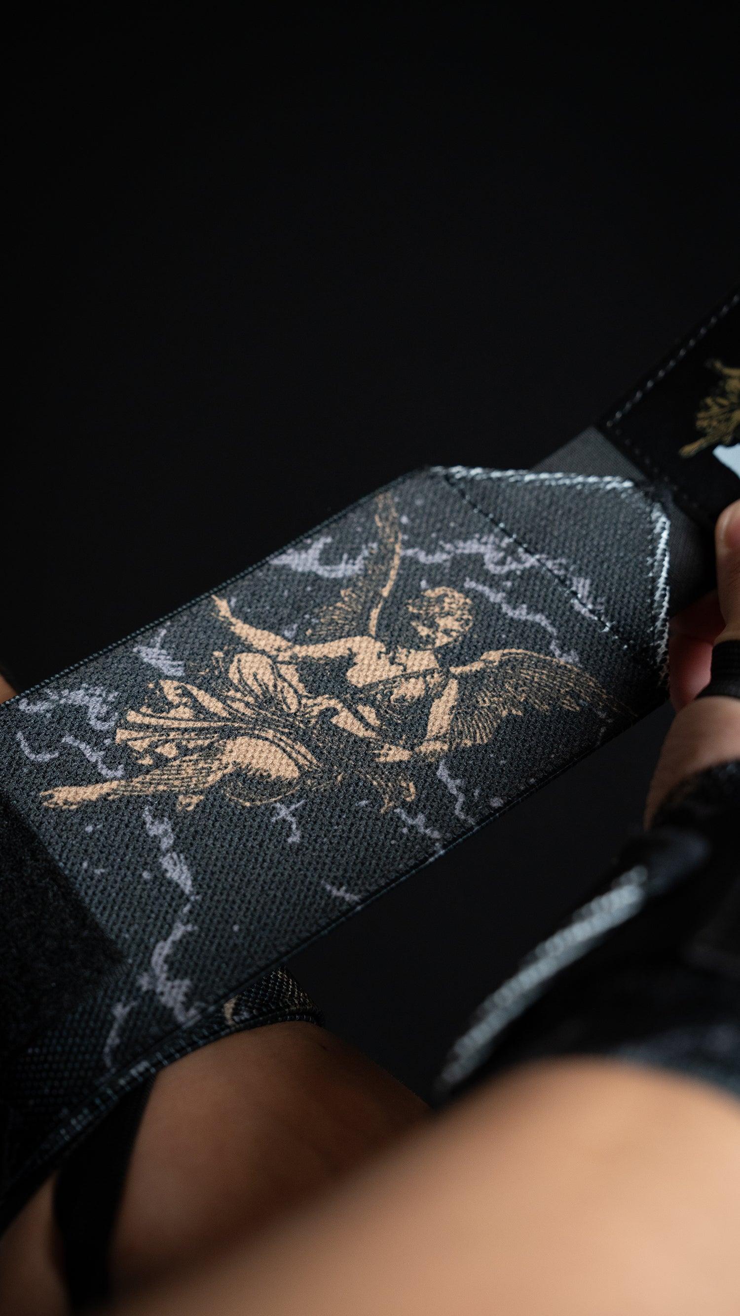 Saint Kaizen Guardian Angels Wrist Wraps. Christian gym wear accessory featuring bold spiritual print and heavy-duty Velcro for stability.