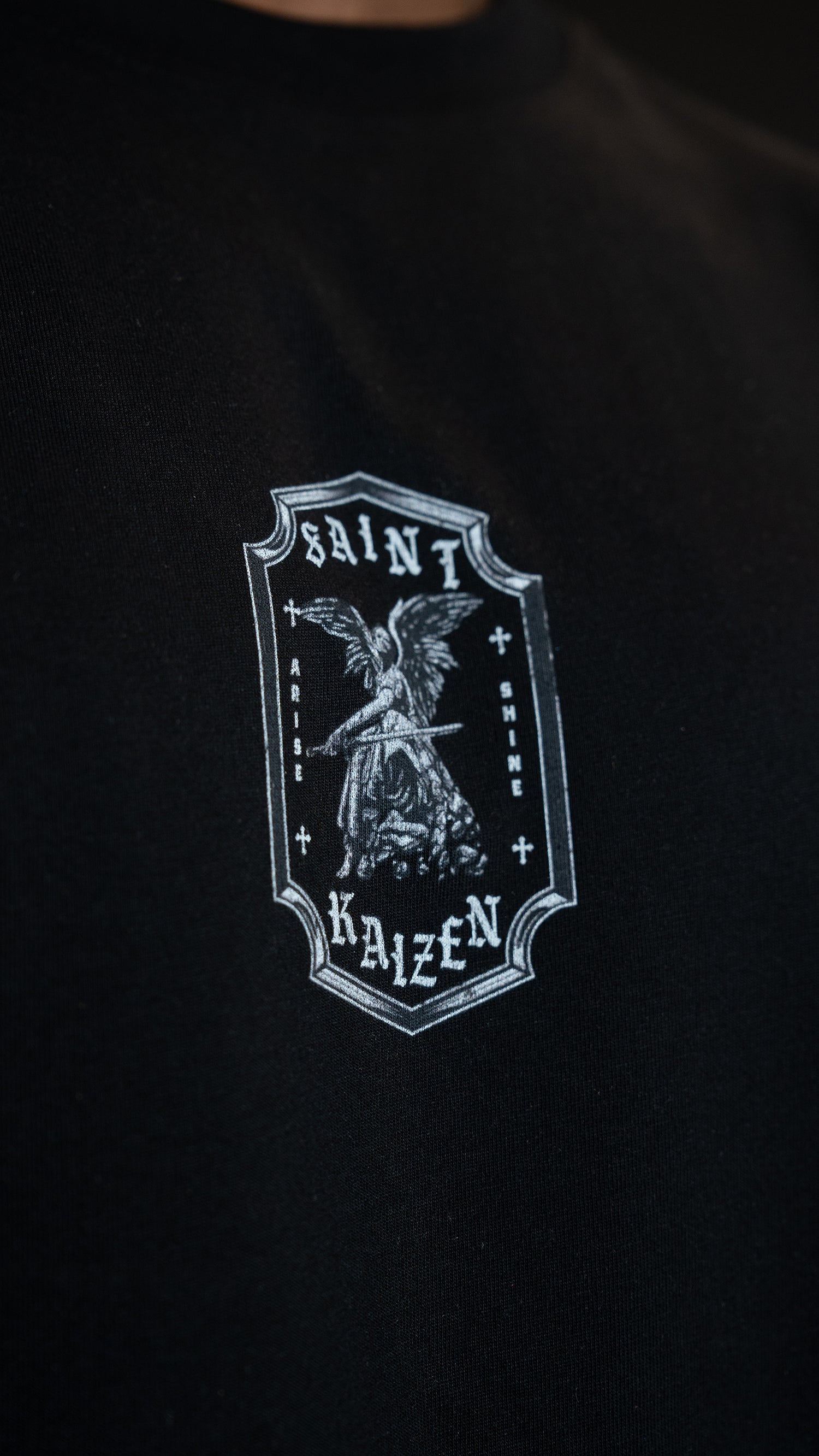 Saint Kaizen Christian gym wear shirt. Features the bold Guardian Of The Light T-Shirt - Black spiritual design. Oversize fit made from premium 220gr cotton.